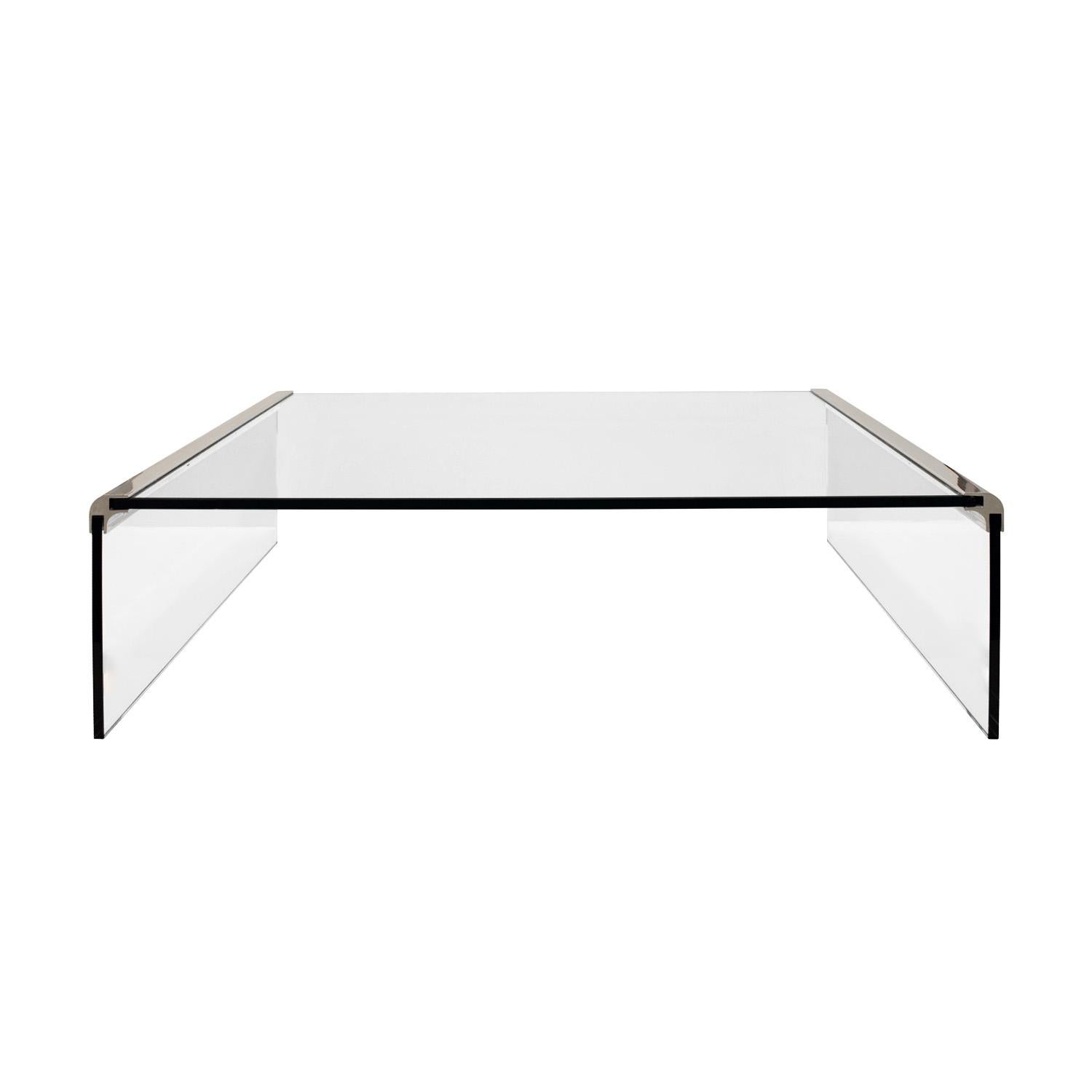 Clean-line waterfall coffee table in polished chrome with thick glass panels by Leon Rosen for Pace Collection, American 1970's.  This coffee table is beautifully  made and very sleek.  Chrome has been professionally polished and Lobel Modern has