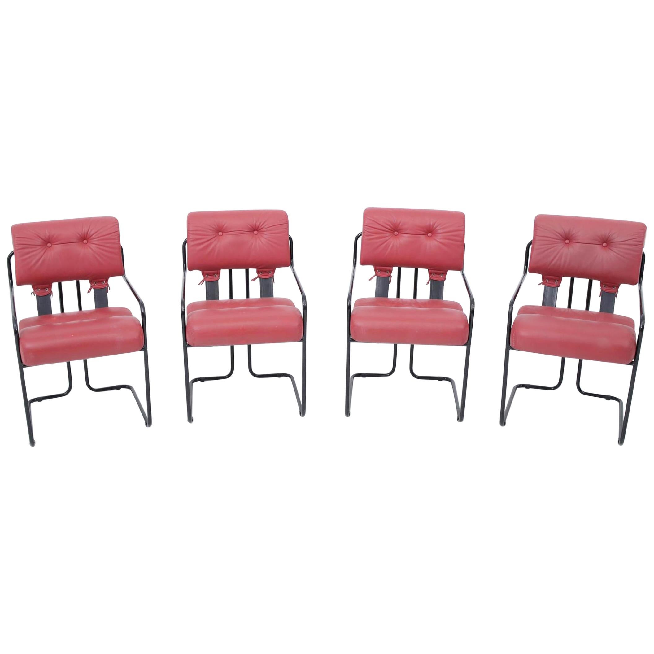 Pace Tucroma dining chairs by Guido Faleschini. Italian red leather and metal.