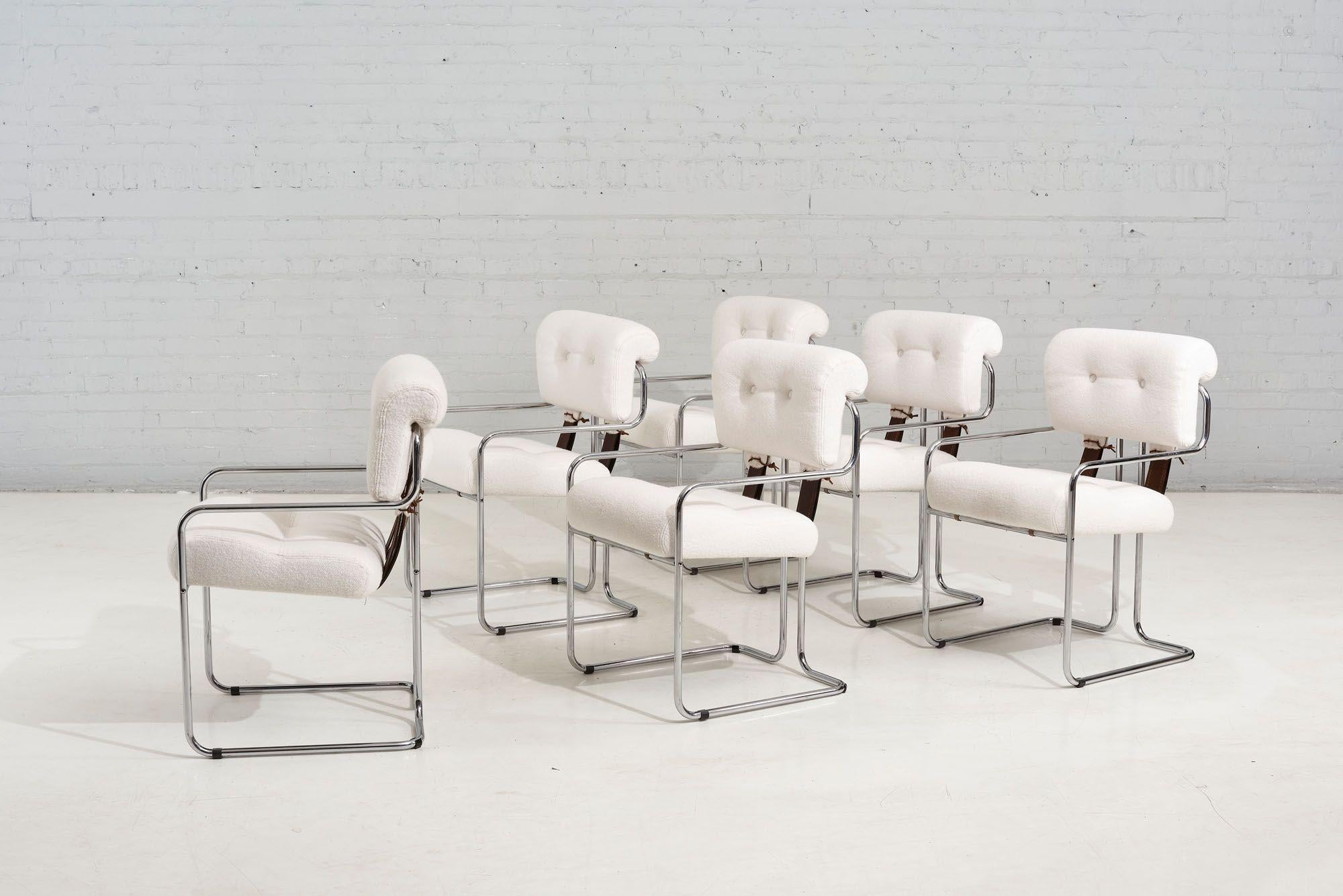 Pace dining chairs white boucle, 1970. White boucle with brown leather strapping.