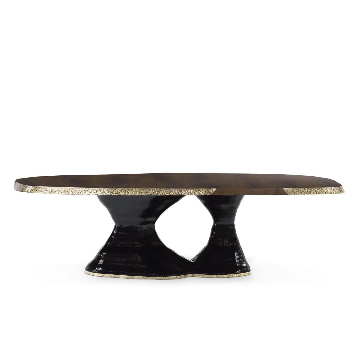 Dining Table Pacha Large with walnut veneer base in 
black lacquered finish. With solid walnut veneer 
table top with solid brass edging in hammered finish.