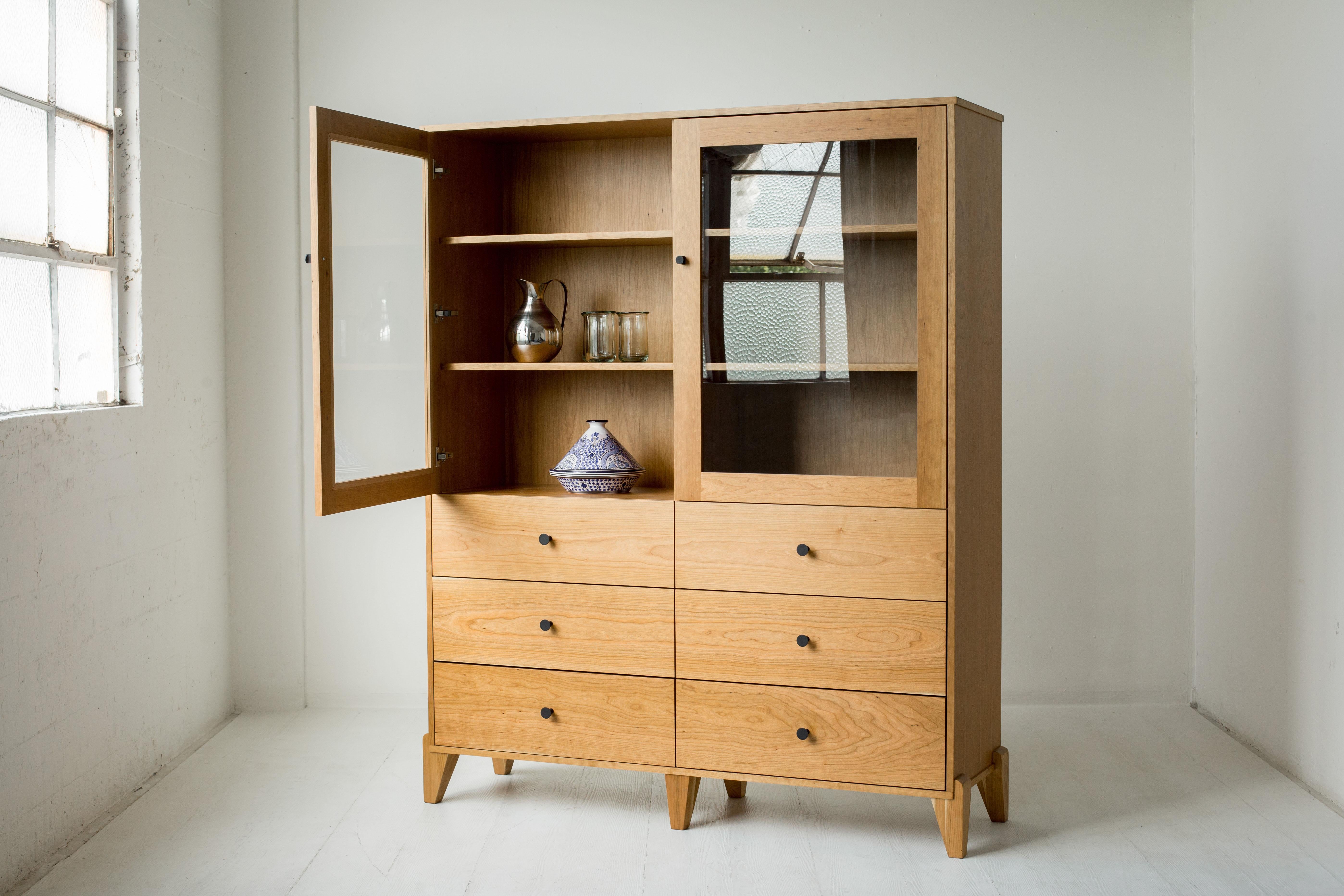 Reveal your favorite keepsakes, display your everyday wares, or simply tuck things away in this elegant modern hutch. The Pacific Curio Cabinet is designed to integrate naturally into your dining or living room. Built with exquisite attention to