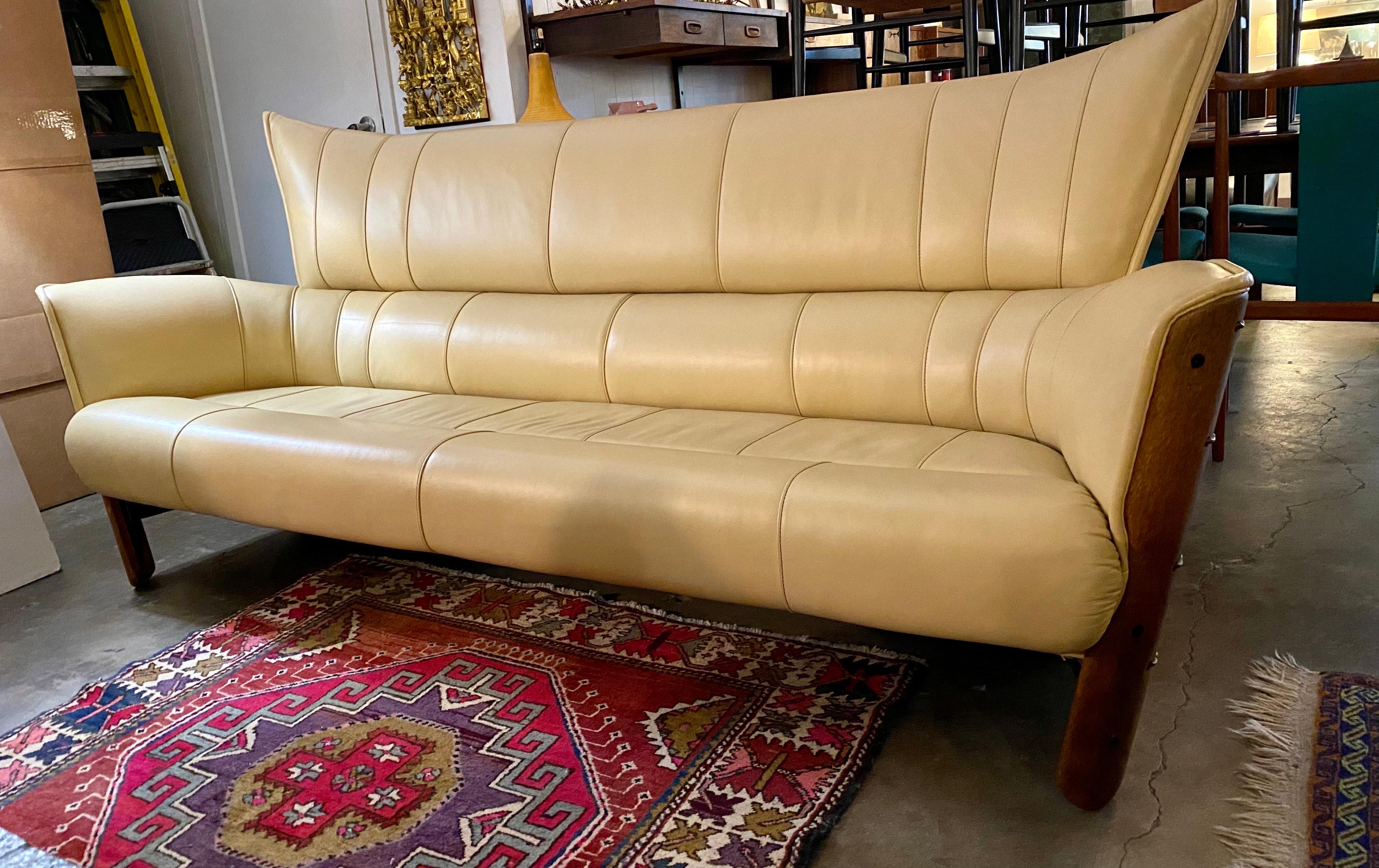 Pacific Green furniture sofa features a beautiful rich texture, a warm tone, and natural materials made of palm wood and leather, Australia, circa 1990s. Dimensions: 87.50