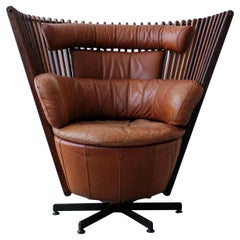 Pacific Green Tavarua Palm Wood and Leather Swivel Chair