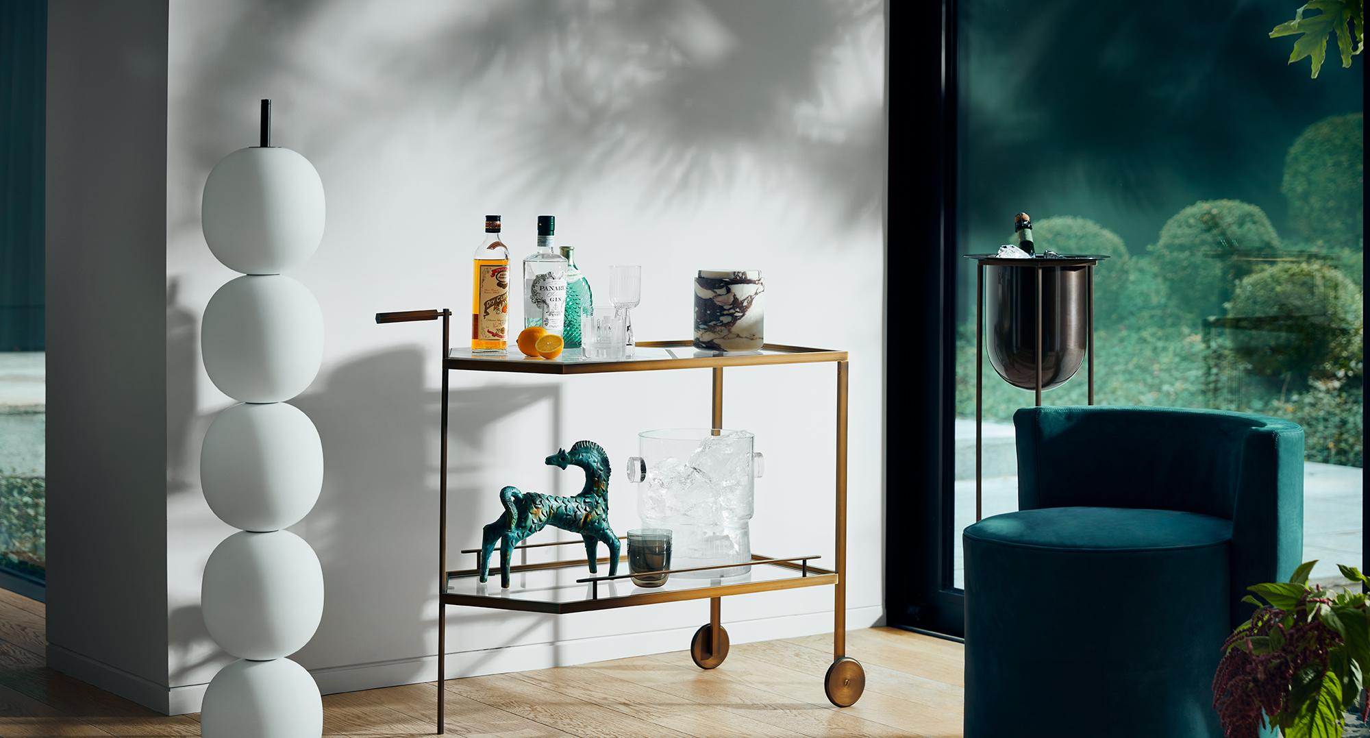 The Pacific Heights wine chiller by Yabu Pushelberg mixes the sophistication of entertaining in the past with a new minimal form. The exacting metal frame is crafted in Italy and comes in smoked bronze or smoked brass finishes as its Gin Lane bar