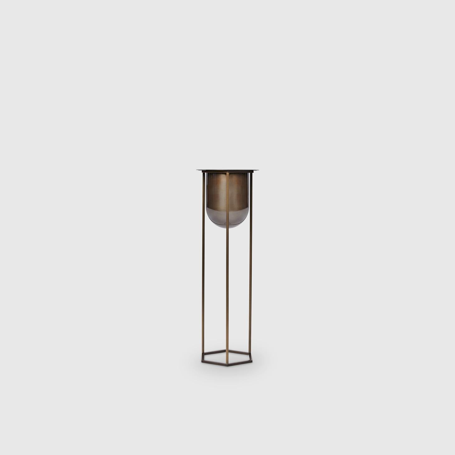 The Pacific Heights wine chiller by Yabu Pushelberg mixes the sophistication of entertaining in the past with a new minimal form. The exacting metal frame is crafted in Italy and comes in smoked bronze or smoked brass finishes as its Gin Lane bar