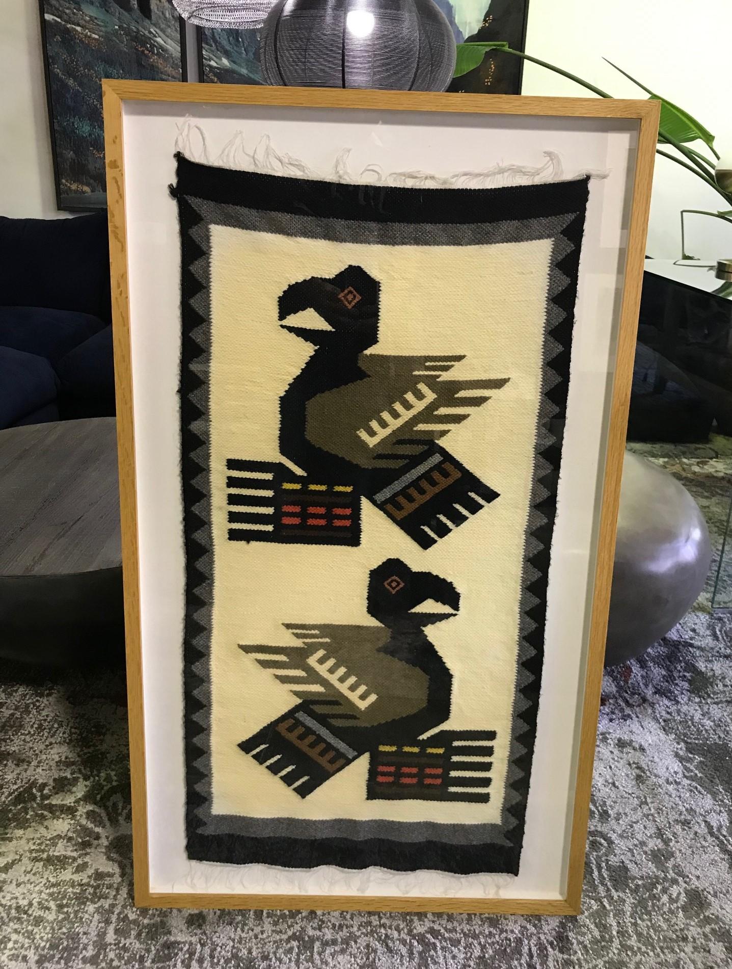 Beautifully designed and wonderfully covered dyed and handwoven Pacific Northwest Coast blanket or rug (likely Haida or Tlingit) featuring two colorful tribal birds.

Nicely framed.

We are listing as the 20th century as we do not know the exact