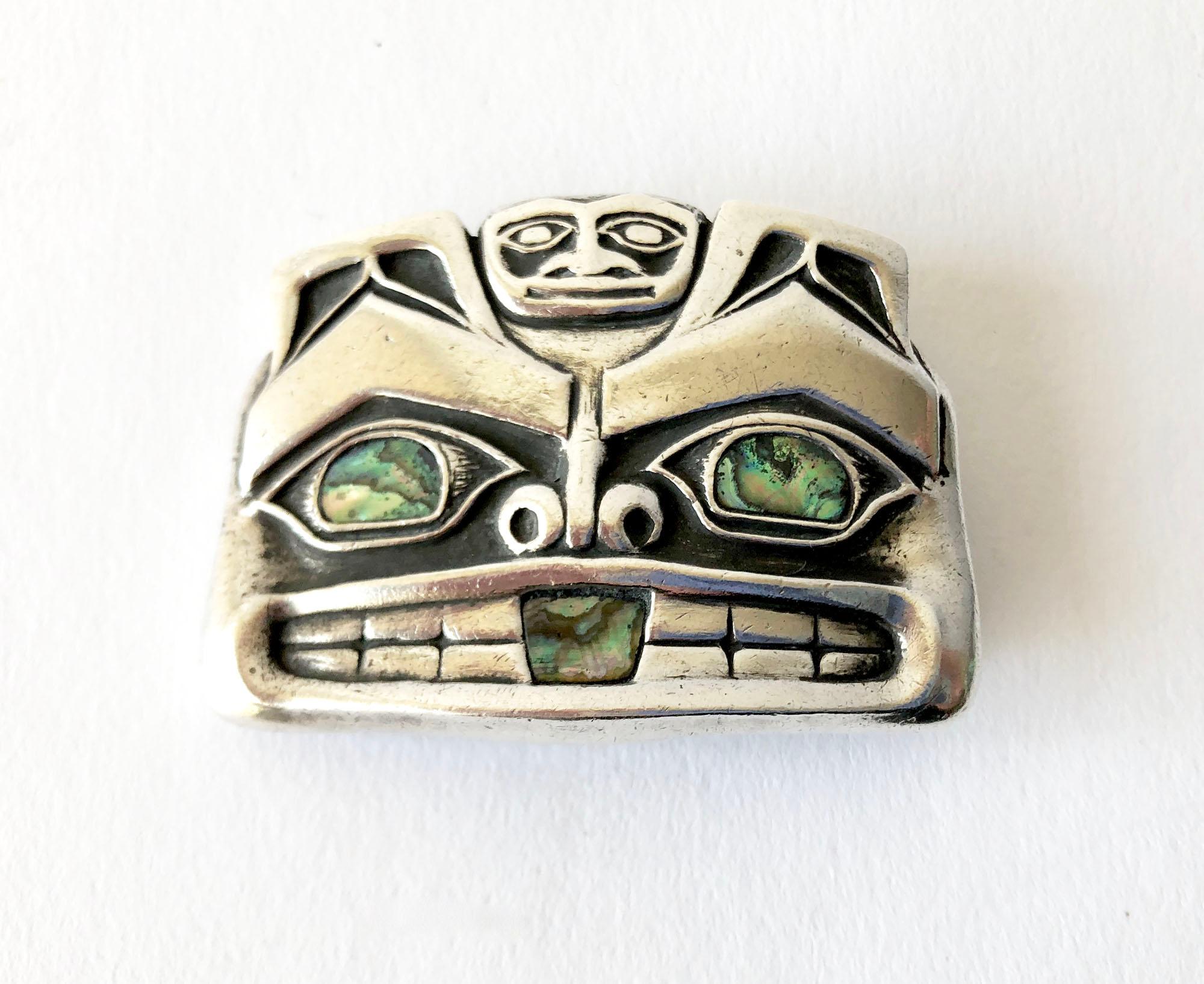 Native American Pacific northwest coast sterling silver mask money clip accented with abalone eyes and mouth.  Clip measures 1 3/8