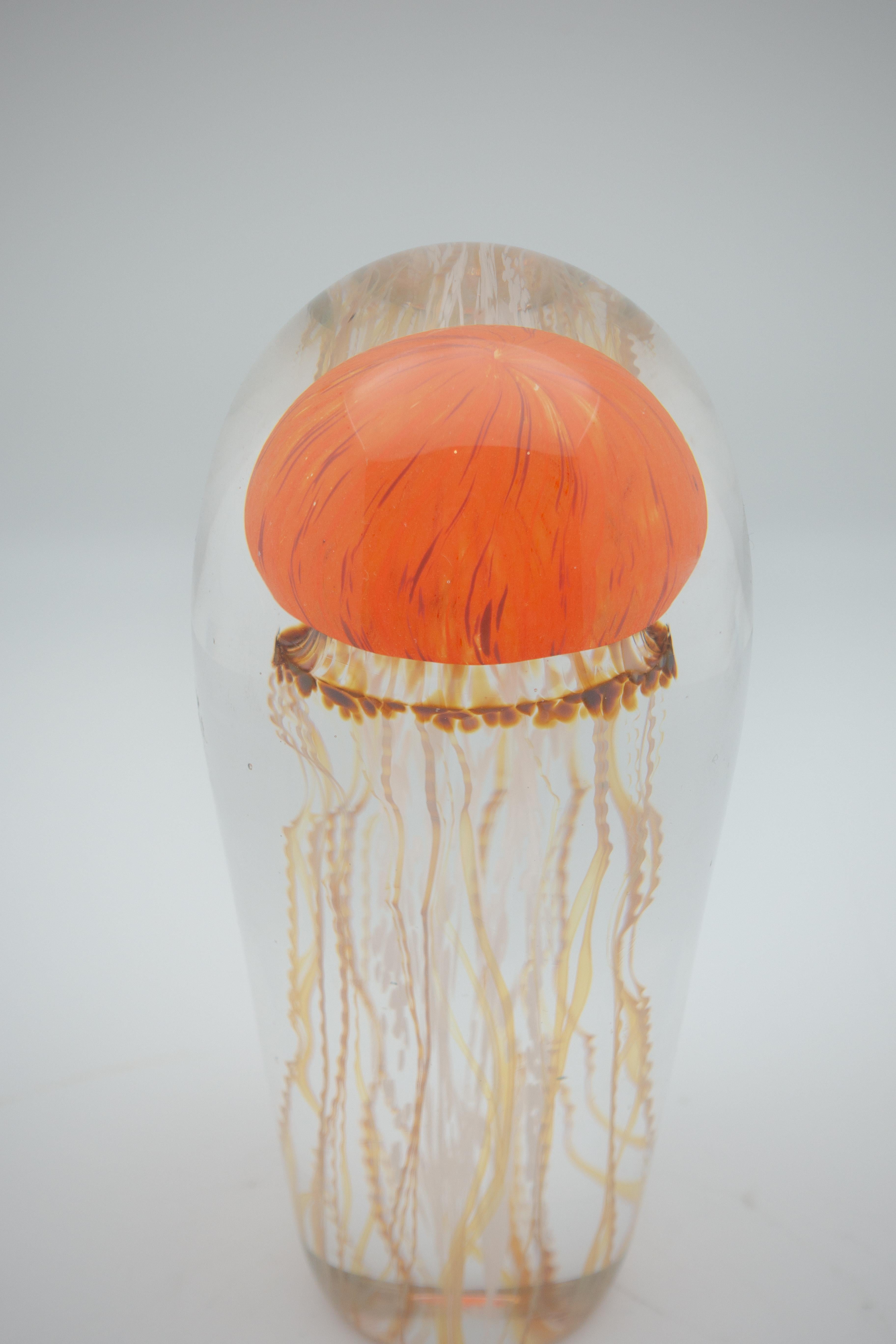 Blown glass sculpture of jellyfish, in Pacific Orange, made in the USA. Other color variations available.