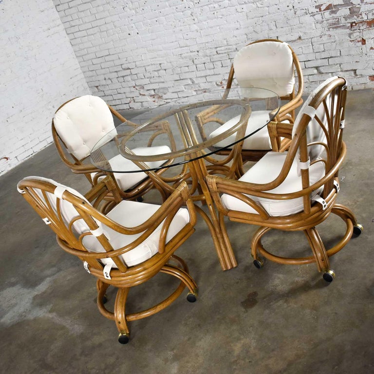 Pacific Rattan Game or Dining Table Round Glass Top and 4 Rolling