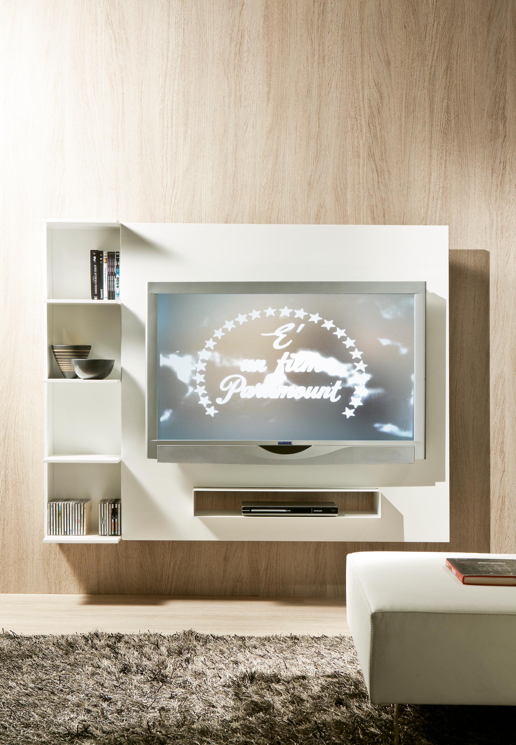 Adjustable TV stand with bookcase unit veneered or in fiberboard, that can be positioned to the right or the left of the TV panel, equipped with universal bar. The panel can be opened and is equipped on the back with CD/DVD compartments or can be