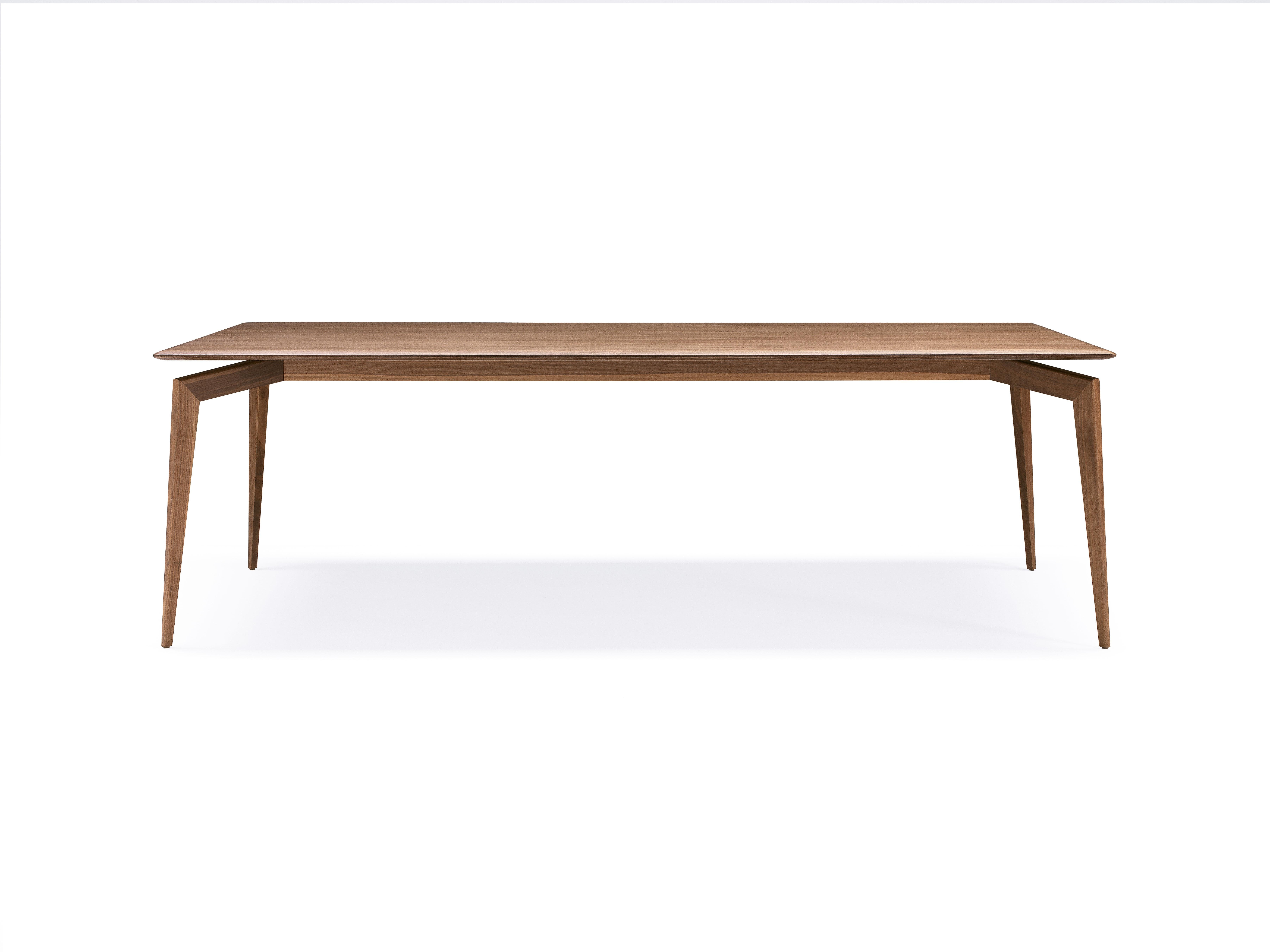 Dining table with structure in solid Canaletto walnut or ash. Wooden top veneered in Canaletto walnut or ash with electro welded supports or in tempered clear or transparent bronze glass (10 or 12 mm th.) with electro welded supports. Available