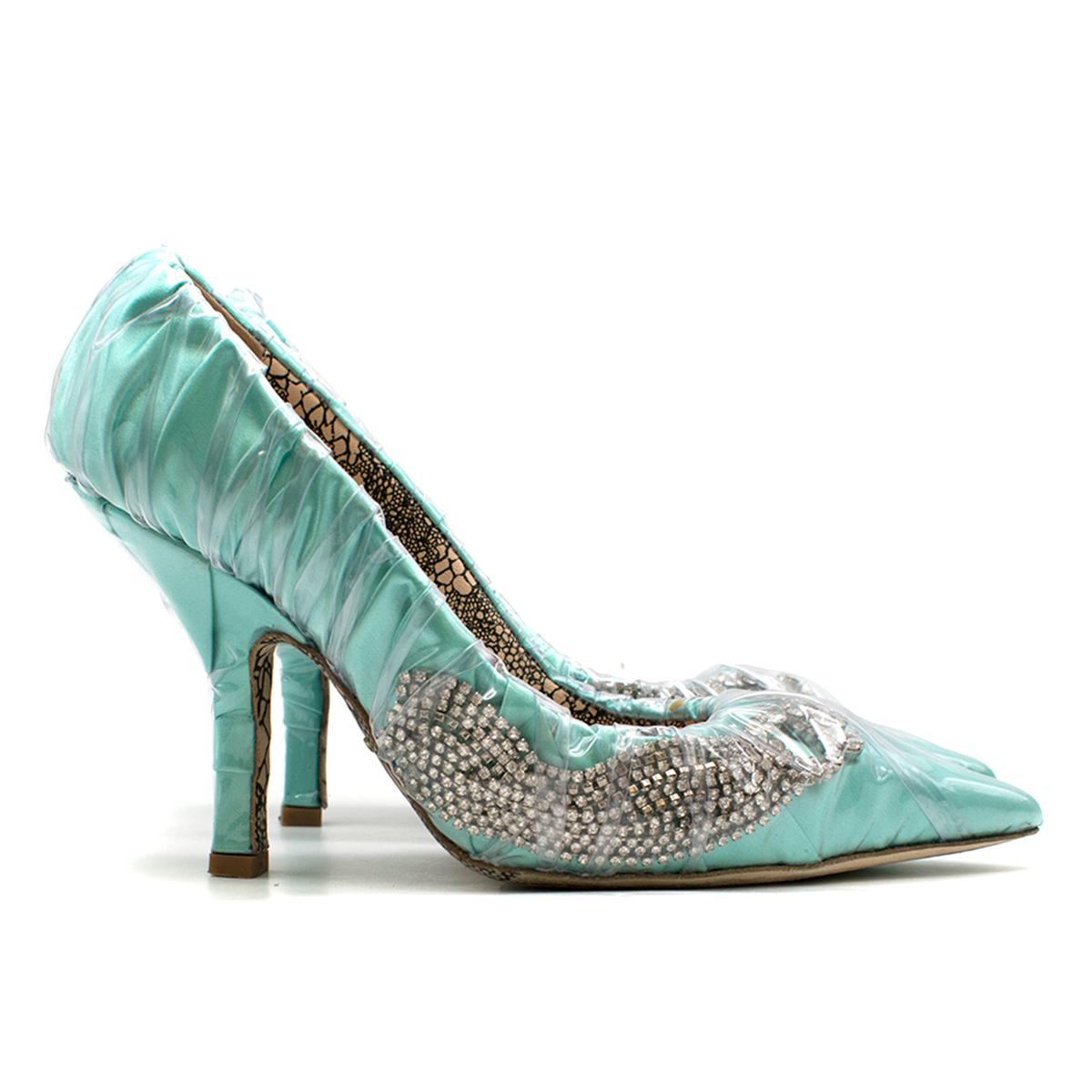 Paciotti By Midnight Crystal-embellished Ruched Satin & PVC Pump

- Turquoise ruched satin pump
- Wrapped in ruched PVC
- Front crystal embellished
- Pointe toe
- 90mm stiletto heel
- Nude leather lining with logo embroidered
- This item comes with