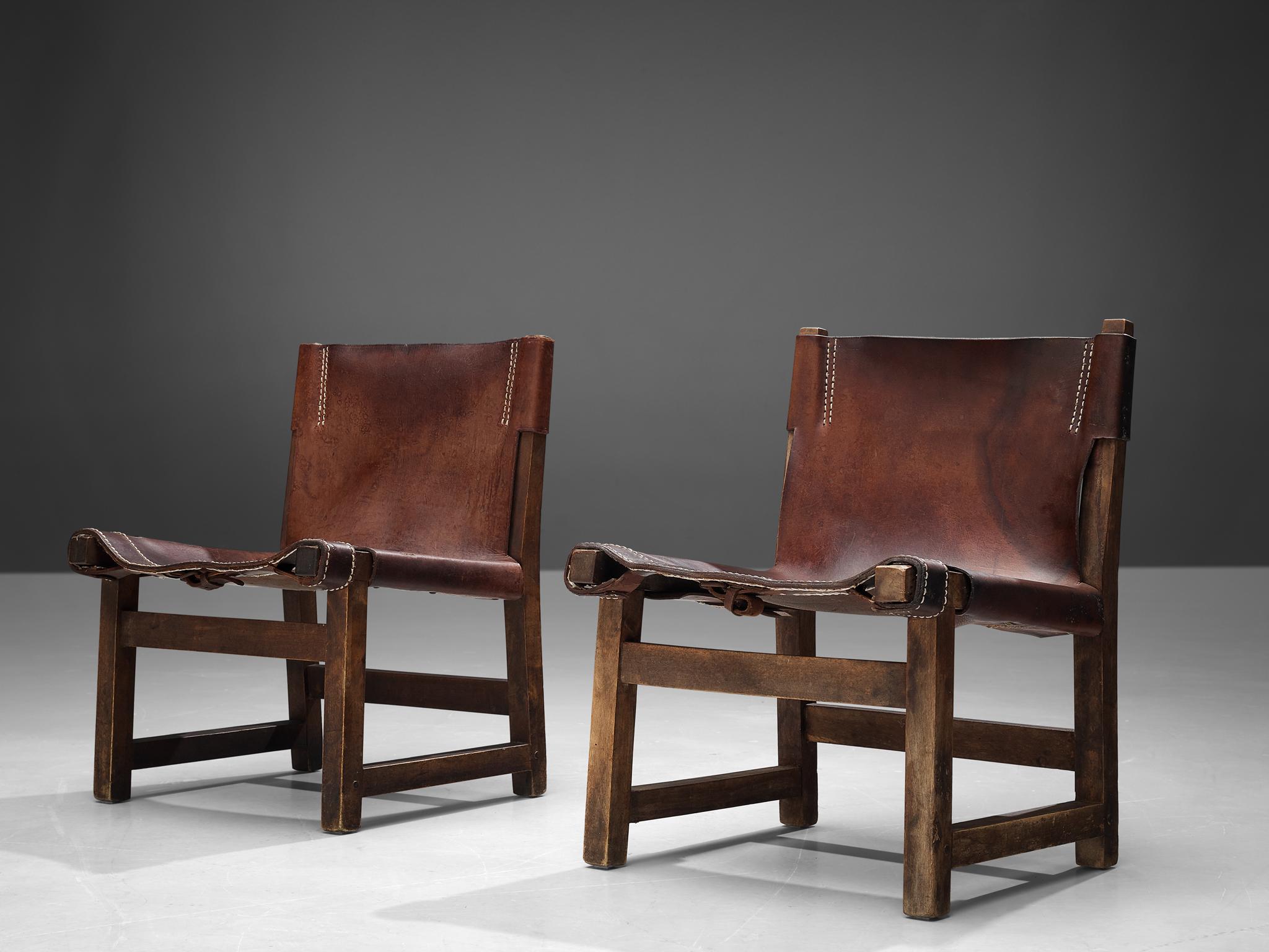 Paco Muñoz for Darro, pair of 'Riaza' chairs for children, samara, leather, metal, Spain, 1960s

This robust and resilient low lounge chair, a creation of Paco Muñoz from the 1960s, epitomizes refined design. Resembling a hunting chair, its