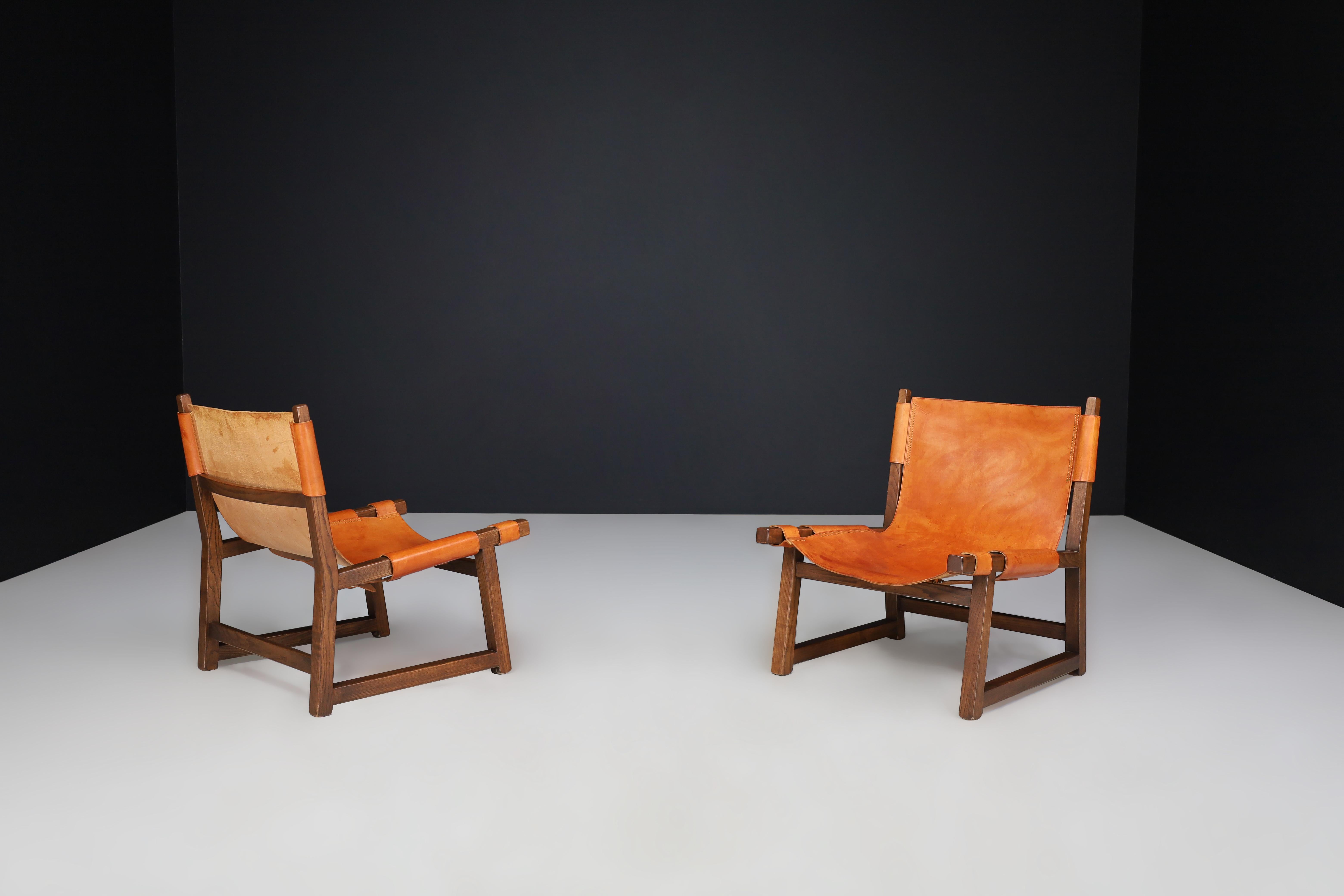 Paco Muñoz paire de chaises de salon 'Riaza' En noyer et cuir cognac Espagne 1960 en vente 2