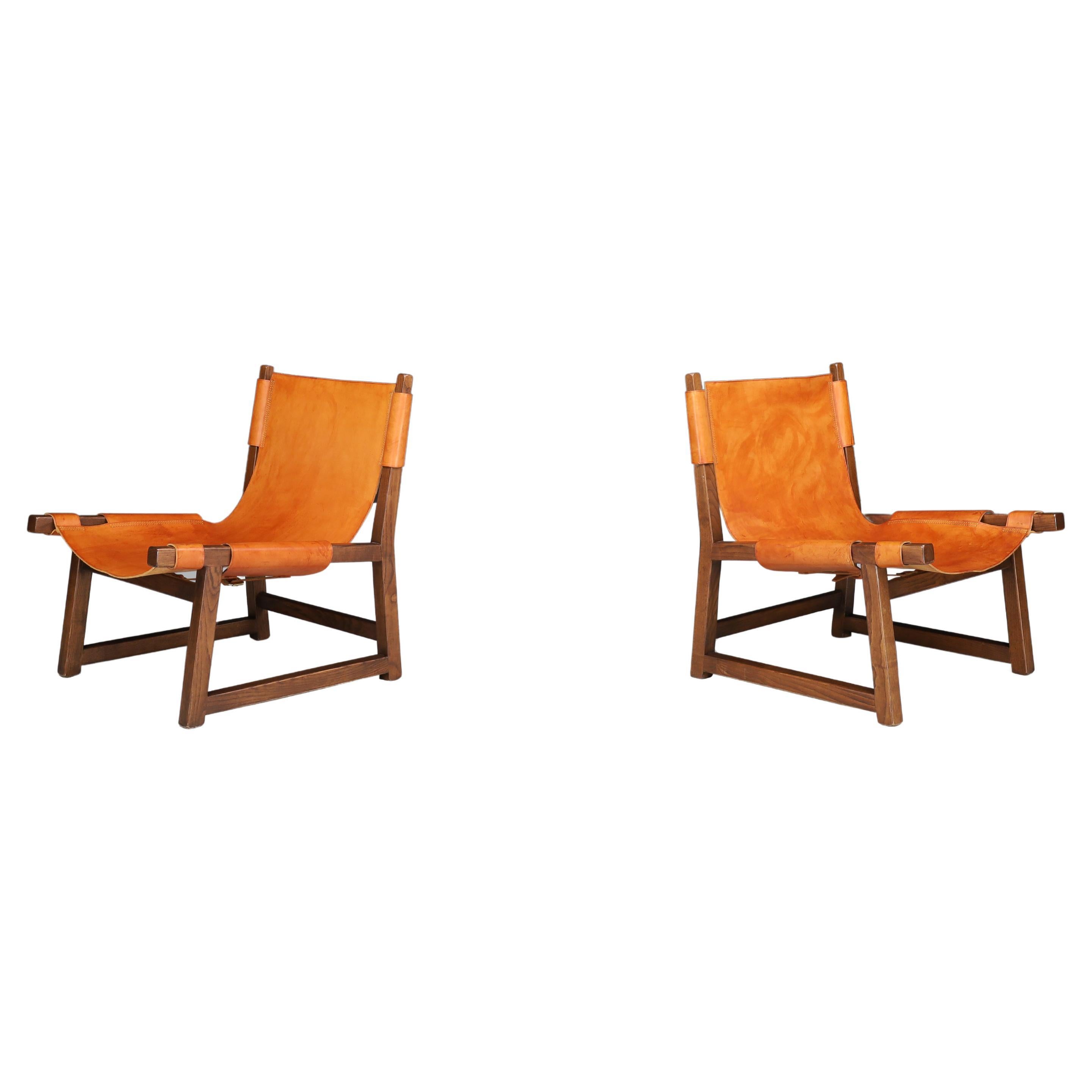 Paco Muñoz pair of 'Riaza' lounge chairs In Walnut and Cognac Leather Spain 1960 For Sale