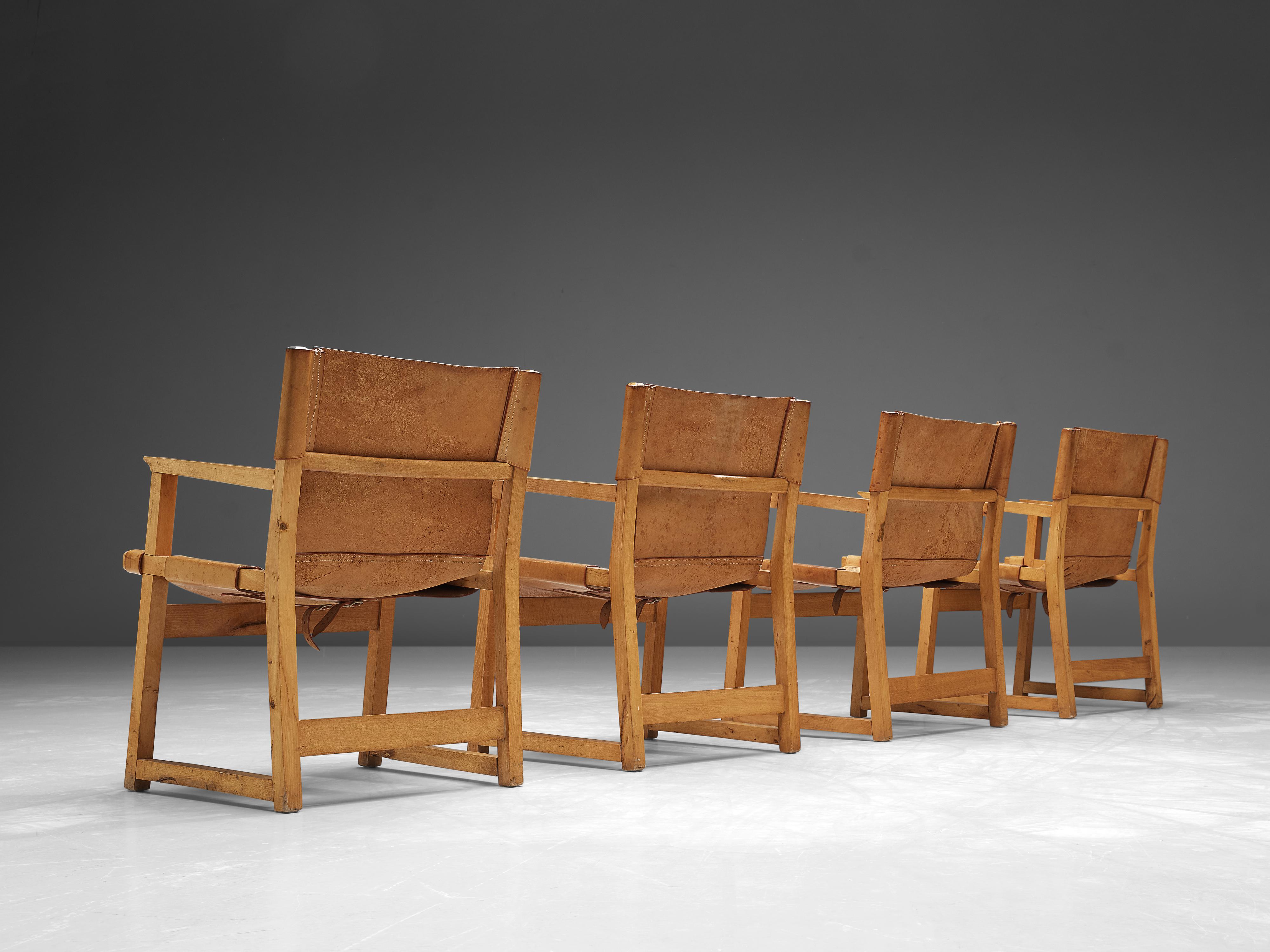 Paco Muñoz, Satz von vier Sesseln, Leder, Buche, Spanien, 1950er Jahre

Safari- oder 'Riaza'-Sessel des spanischen Designers Paco Muñoz aus der Jahrhundertmitte. Diese Stühle sind aus hochwertigem Sattelleder mit abnehmbaren Schnallen unter der