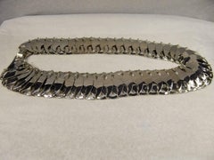 Cintura Paco Rabanne degli anni '70 con dischi metallici e chiusura a gancio, 86 cm