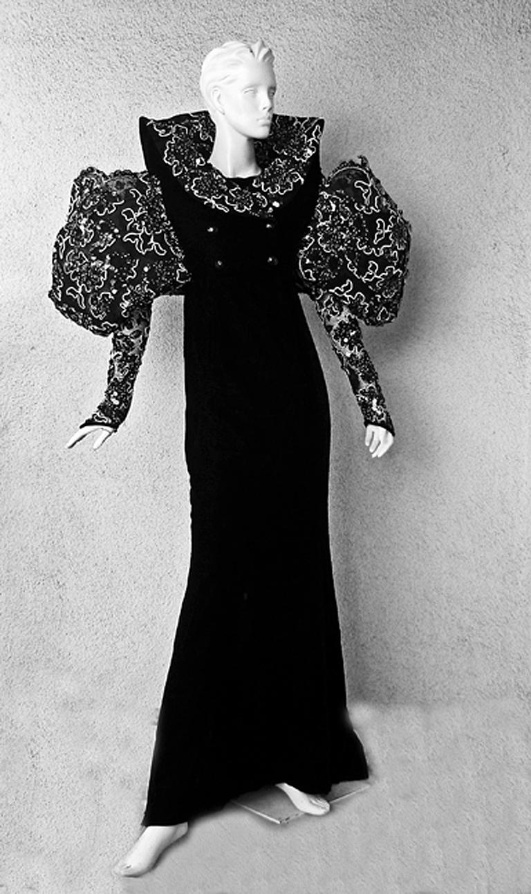 1985 Paco Rabanne Couture one-of-a-kind gown fashioned of silk velvet with bolero of heavily embroidered soutache and sequins in a floral motif.   The attached bolero give the illusion of a separate jacket.  This opulent gown designed with