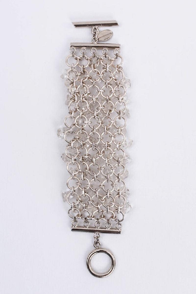 Paco Rabanne - Soft silver-plated bracelet with glass beads.

Additional information:
Dimensions: Length: 20 cm (7.87 in) 
Width: 6 cm (2.36 in)
Condition: Very good condition
Seller Ref number: BRA91 