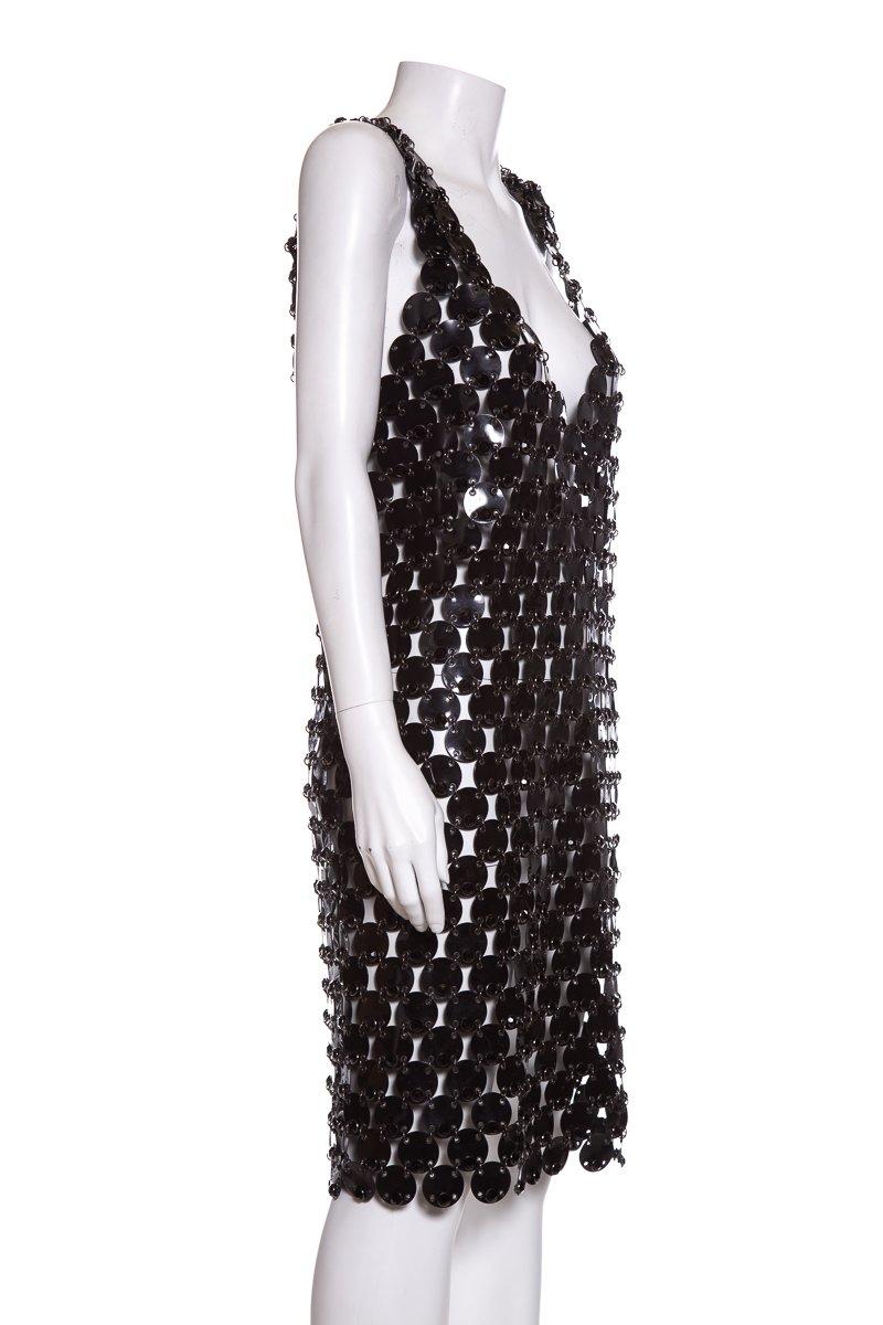 Paco Rabanne black sleeveless Rhodoid dress with deep V neckline, scalloped hem, and black crystal embellishments throughout.

This item is in very good condition with no signs of wear or imperfections. 

Make origin and fabric information