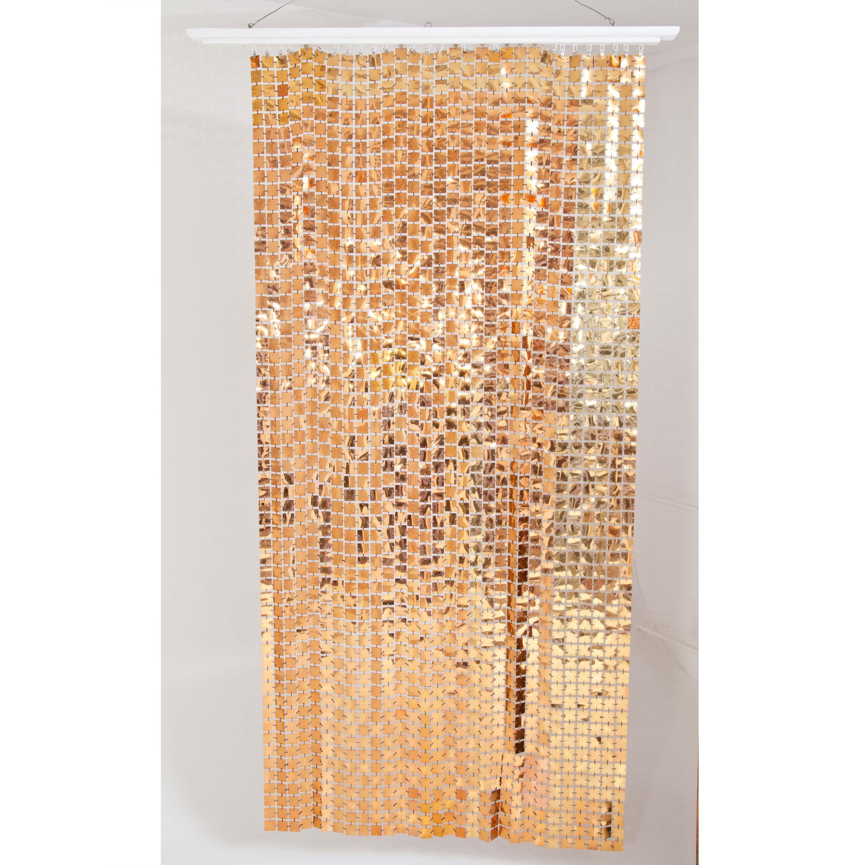 Pair of Paco Rabanne curtains made of thin metal plates in the style of his couture dresses from the 1960s. The squares are all each individually linked by small hooks.