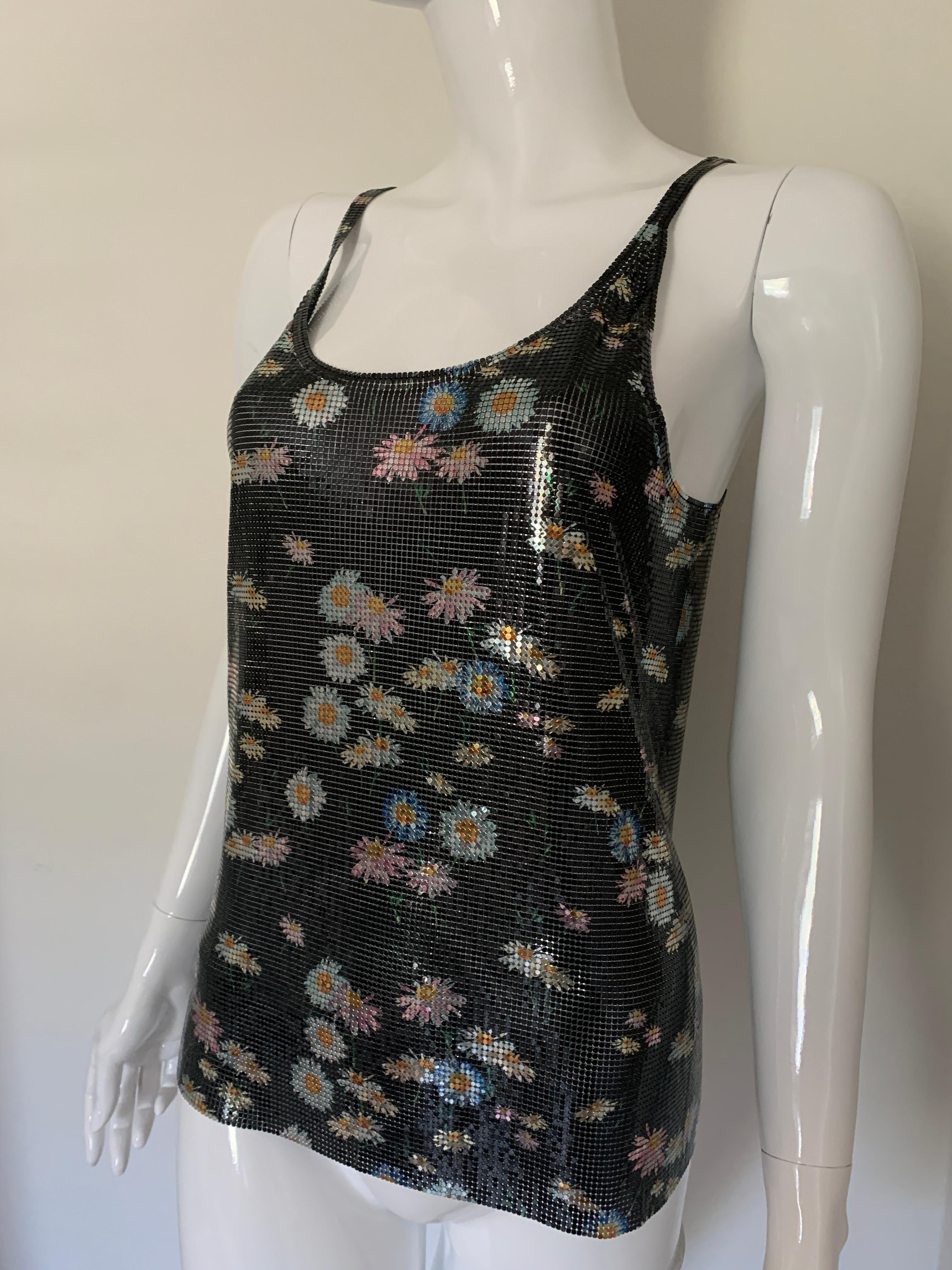 Multicolour aluminium floral chainmail top from Paco Rabanne featuring a floral print, a scoop neck, a sleeveless design, a scoop back and a straight hem.
Aluminium 100%
Made in France
Size Small 

Retail $7161

No signs of wear. 