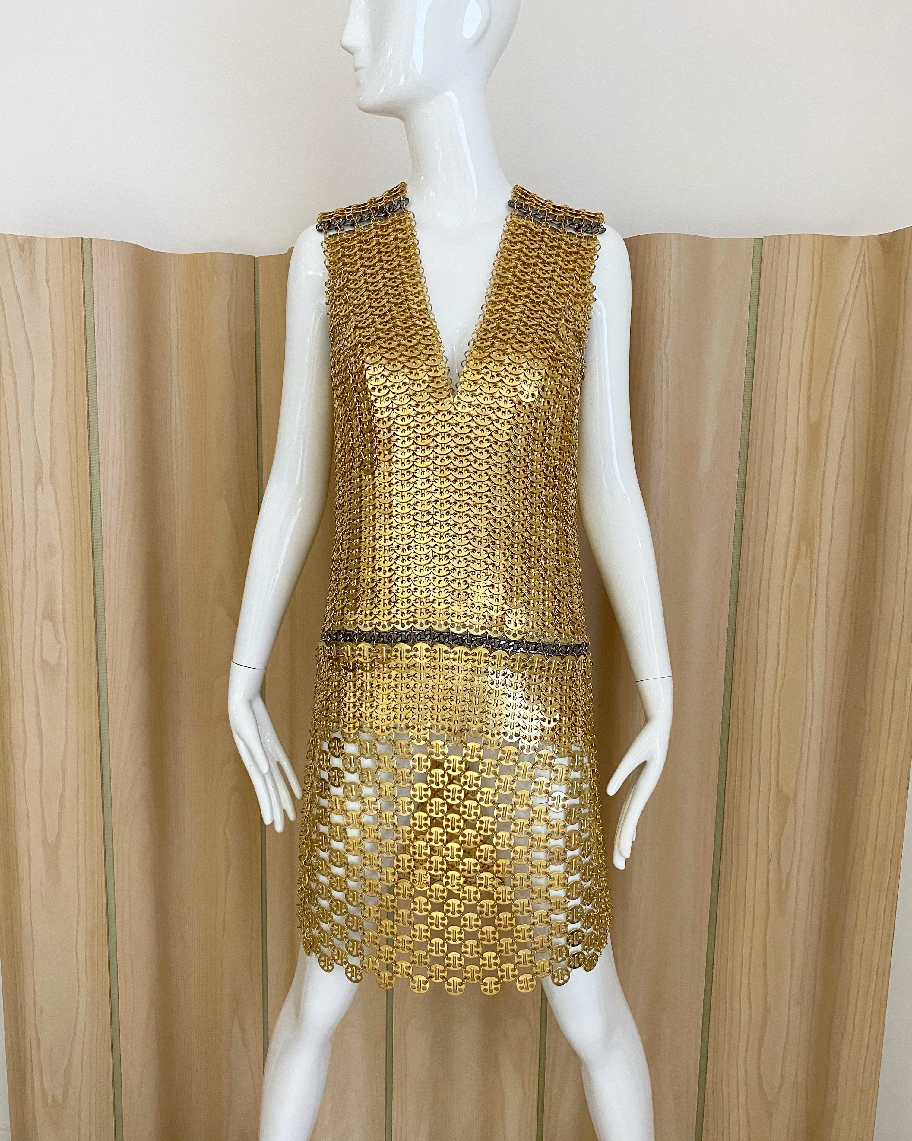 Never worn Paco Rabanne Gold chain link sleeveless cocktail dress.
New with tag.
In excellent condition.
Fit size 4-6