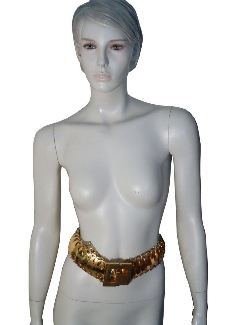 PACO RABANNE stunning gold tone iconic metal disc link belt featuring a massive cut out 