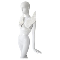 PACO RABANNE Corpiño superior de lentejuelas con alas de ángel digno de un museo