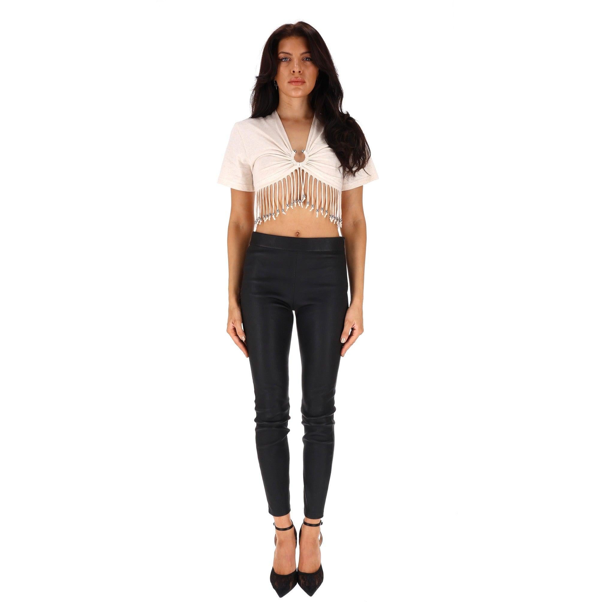 Paco Rabanne Organic Cotton Cropped Tassel Top

Débardeur en coton ivoire avec encolure en V, orné d'anneaux et de perles. 

ourlet à franges.

Rrp £343

Taille - 34FR

Condition - Excellente

Composition - Coton 