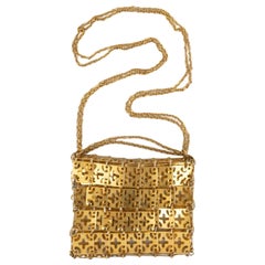 Paco Rabanne Pastilles in Gilded Metal Bag