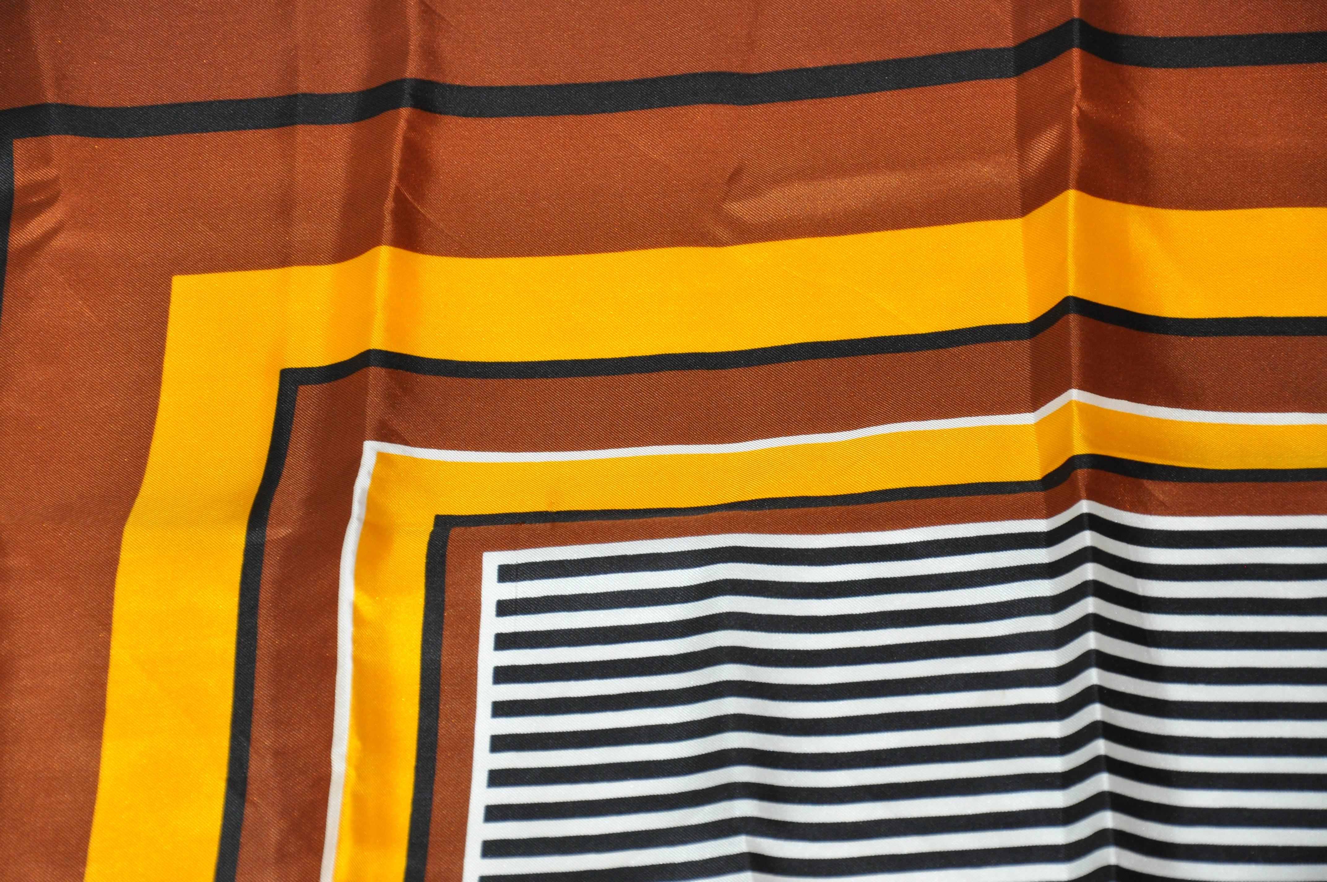 Paco Rabanne Rich Shades of Browns and Yellow Striped Center Silk Scarf In Good Condition For Sale In New York, NY
