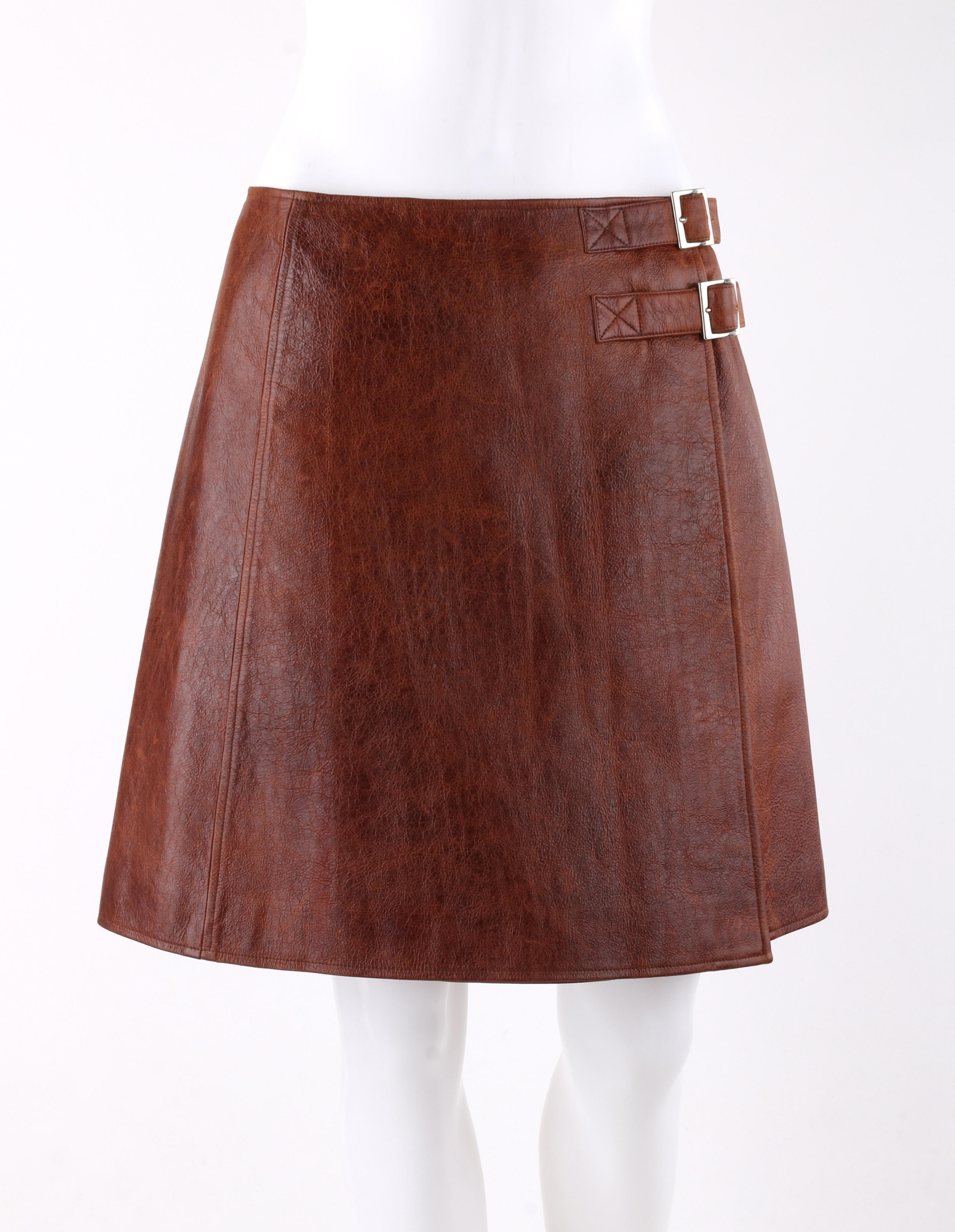 PACO RABANNE Sienna Brown Lamb Leather Dual Buckle A-Line Wrap Skirt
 
Brand / Manufacturer: Paco Rabanne 
Style: Wrap Skirt
Color(s): Brown
Lined: Yes      
Marked Fabric Content: Composition: 100% Lamb; Lining: 100% Acetate 
Additional Details /