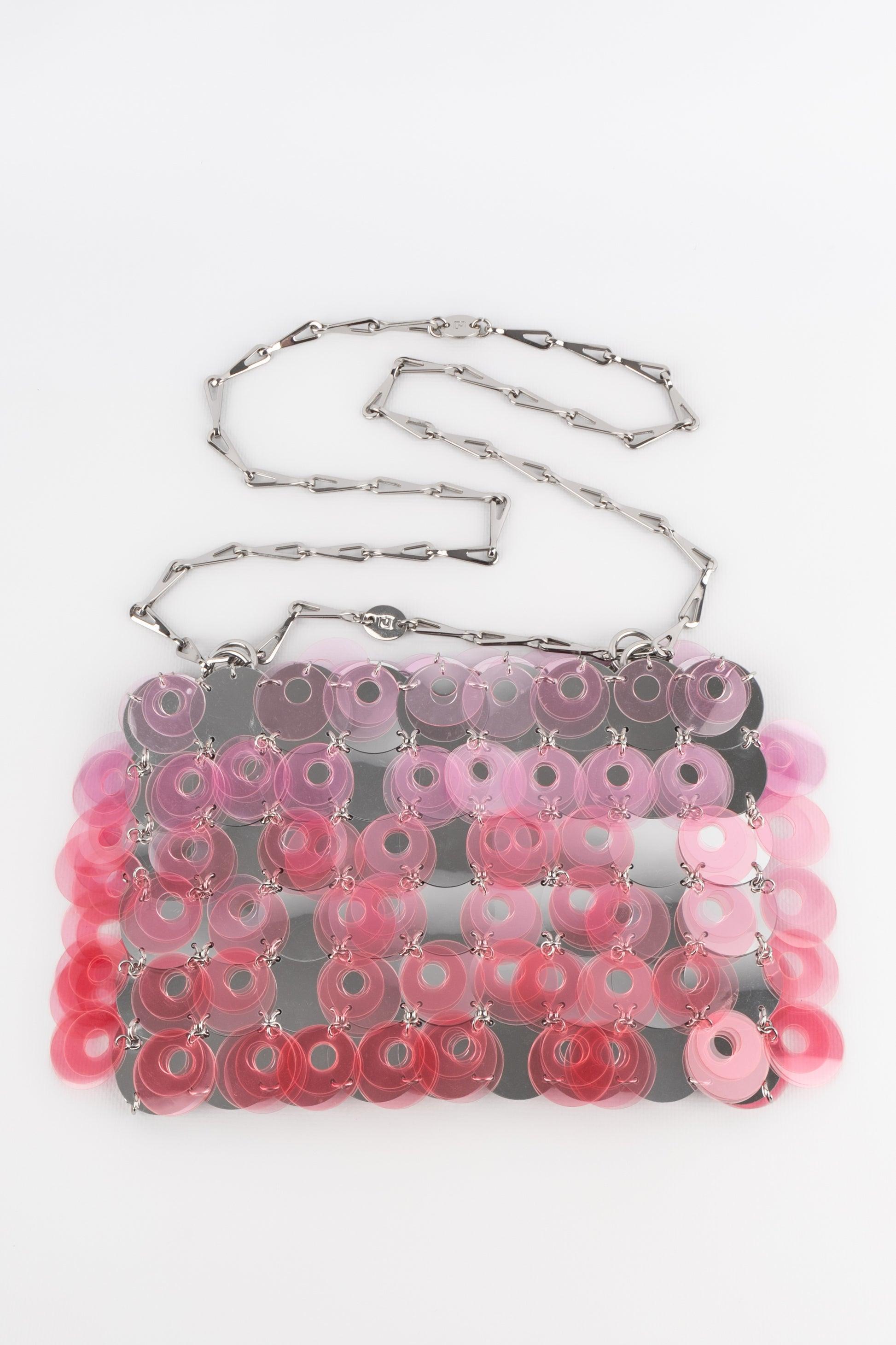Paco rabanne - Bag made of silvery and transparent pink pastilles. Silvery metal elements. 2022 Collection.

Additional information:
Condition: Very good condition
Dimensions: Length: 25 cm - Height: 16 cm - Depth: 1 cm - Handle: 100 cm

Seller