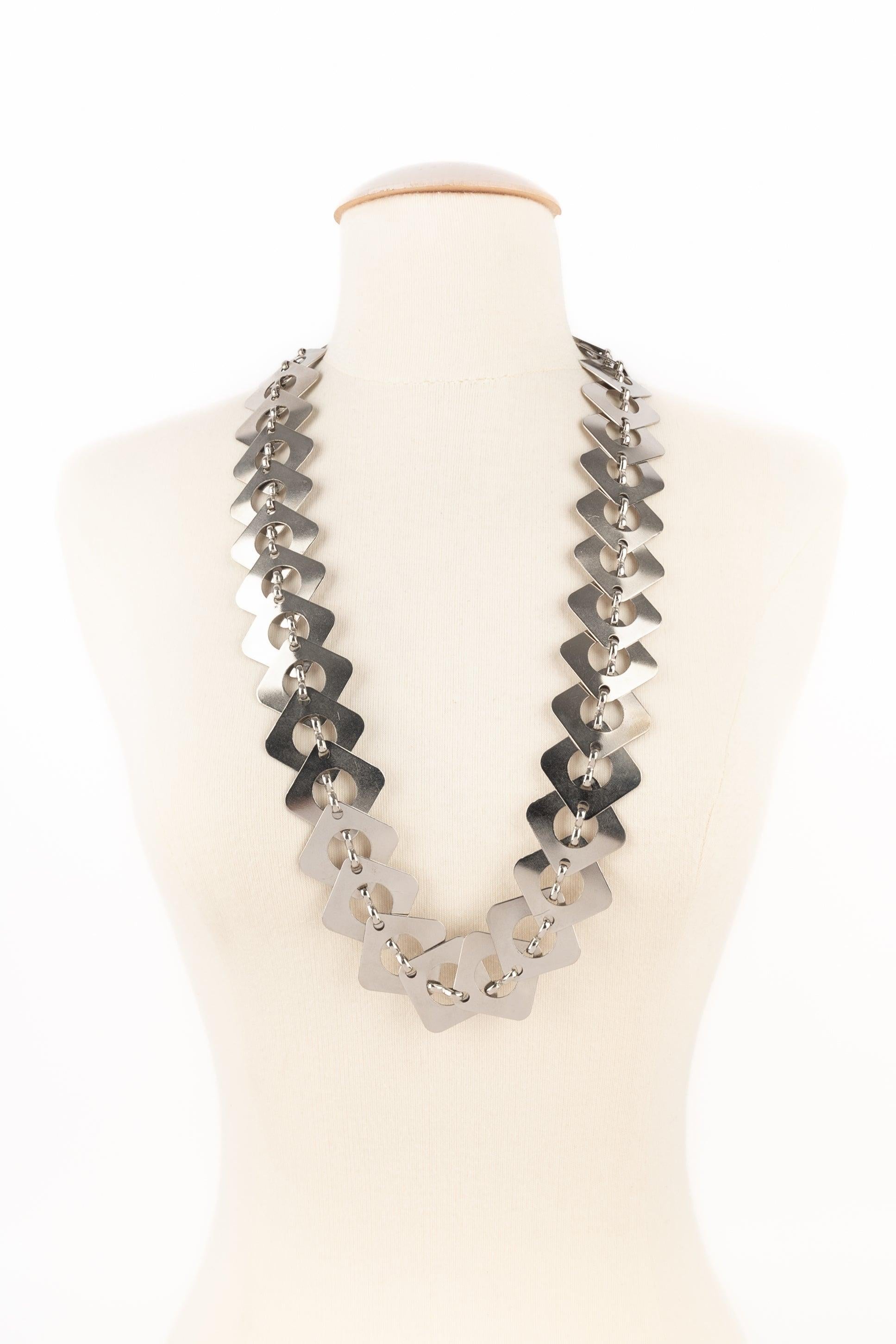 Paco Rabanne - Silvery metal articulated belt. Not signed piece from the 1970s.

Additional information:
Condition: Very good condition
Dimensions: Length: from 83 cm to 97 cm
Period: 20th Century

Seller Reference: ACC257