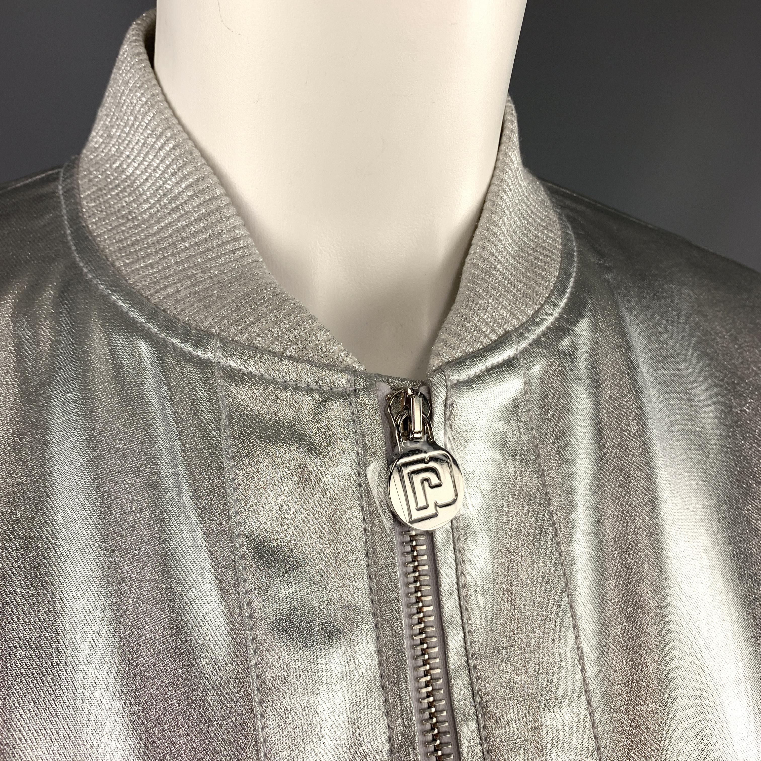 PACO ROBANNE light weight bomber jacket comes in metallic silver coated twill with a double zip front, slit pockets, ribbed sparkle knit baseball collar and cuffs, and elastic back gathered waistband. Made in Portugal.

New without Tags. Pre-Owned