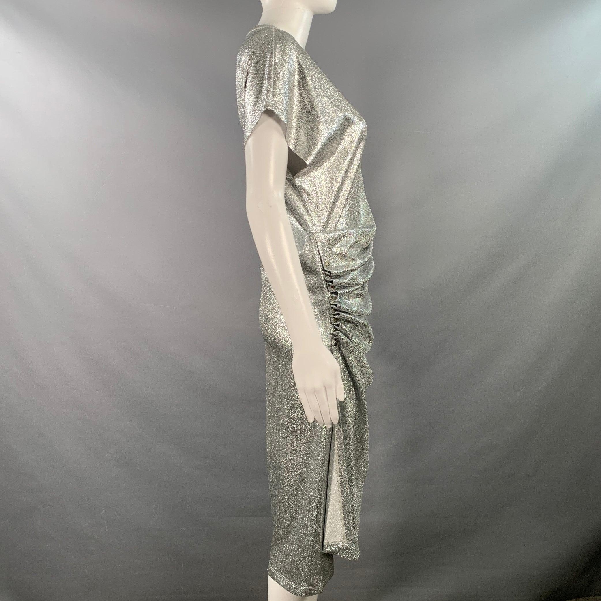 PACO RABANNE cocktail dress
in a metallic silver tone viscose blend fabric featuring an asymmetrical skirt, ruched side details, and cap sleeves.Very Good Pre-Owned Condition. Minor mark inside of garment. 

Marked:   size not marked 

Measurements: