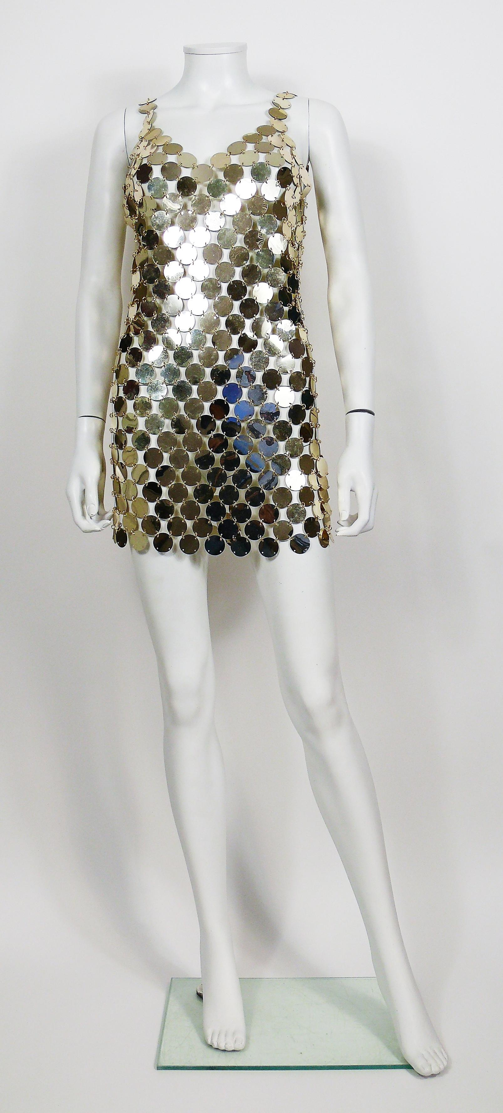 PACO RABANNE vintage DIY rhodoid disc mini dress from 1996, rare and collectable example of a re-issued of the iconic 1966 PACO RABANNE dress (photographied on the cover of the British Vogue - May 1966 / see photo).

This dress is made of hundreds