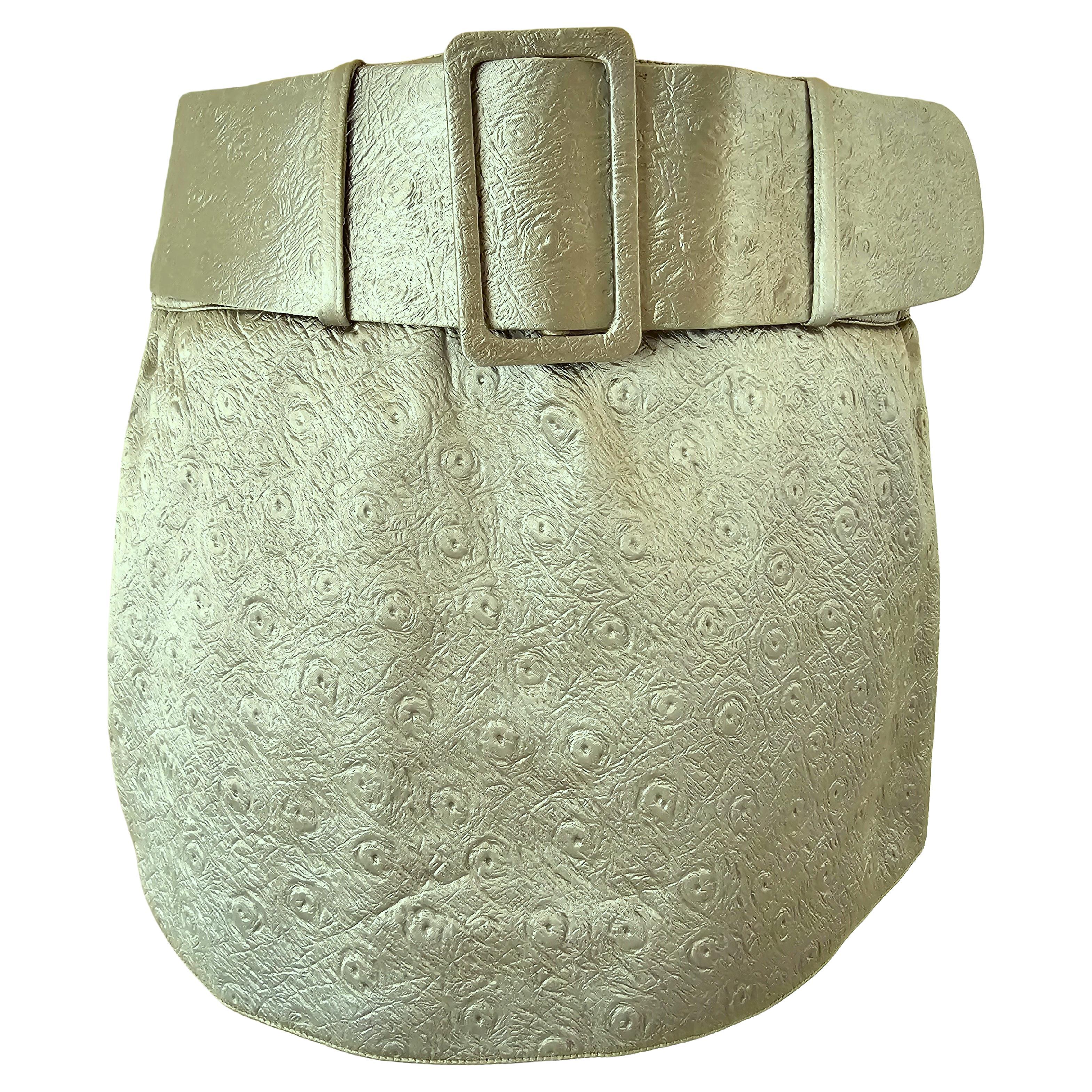 This very rare Paco Rabanne Miniskirt from the 1990s is a vintage piece that exemplifies the brand's innovative approach to fashion during that era. Crafted from softgreen (was hard to get the softgreen colour on the images) acetate, a material