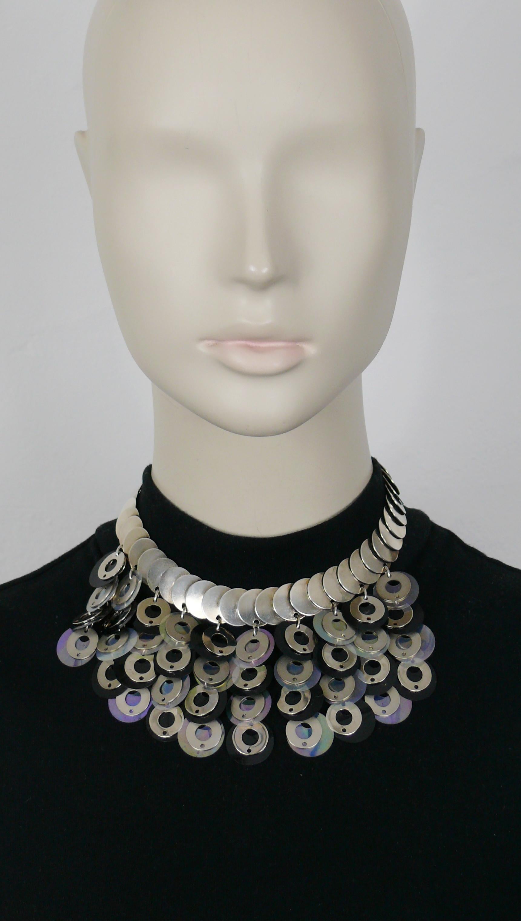 PACO RABANNE vintage necklace featuring articulated silver tone metal discs embellished with black and clear rhodhoid disc cascade.

Lobster clasp closure.
Extension chain.

Marked PACO RABANNE Paris.

Indicative measurements : length from approx.