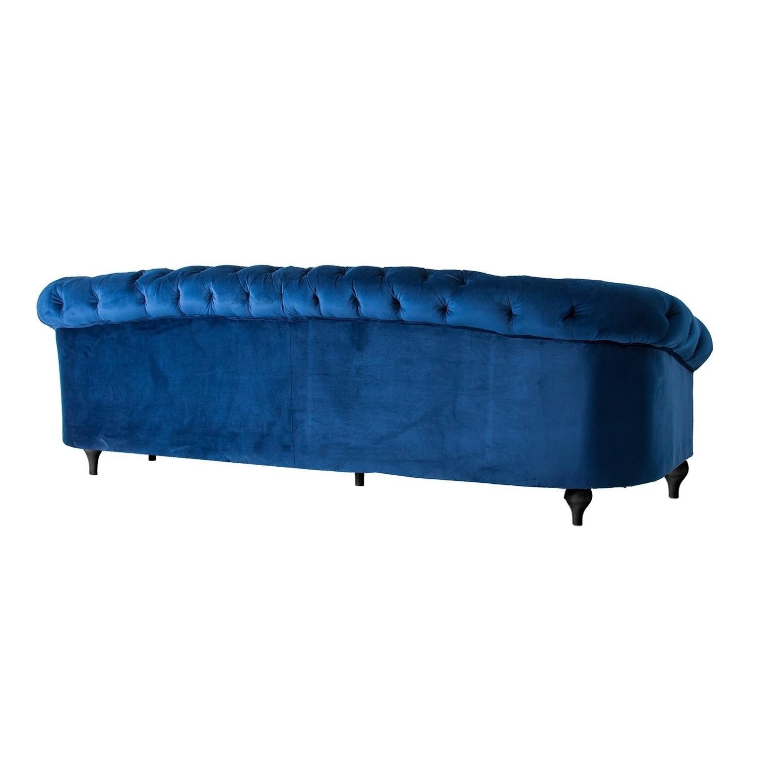 Deep blue velvet and black feet padded soft and comfy sofa.