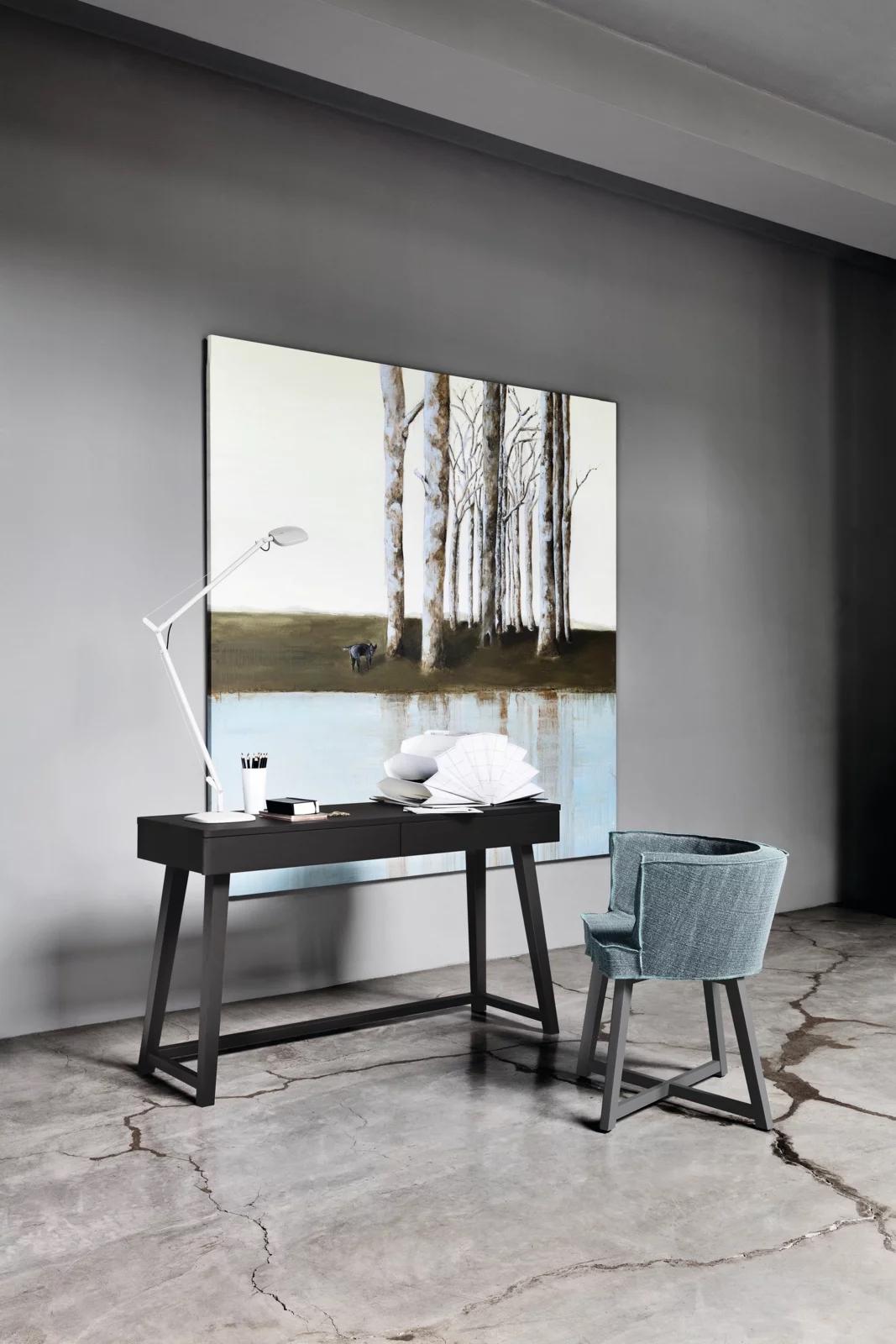 Brand: Gervasoni
Design: Paola Navone
Model: Gray 26 Armchair

The Gray 26 Armchair by Gervasoni, designed by Paola Navone, is a refined dining armchair featuring an enveloping semicircular backrest and padded armrests, providing both comfort and