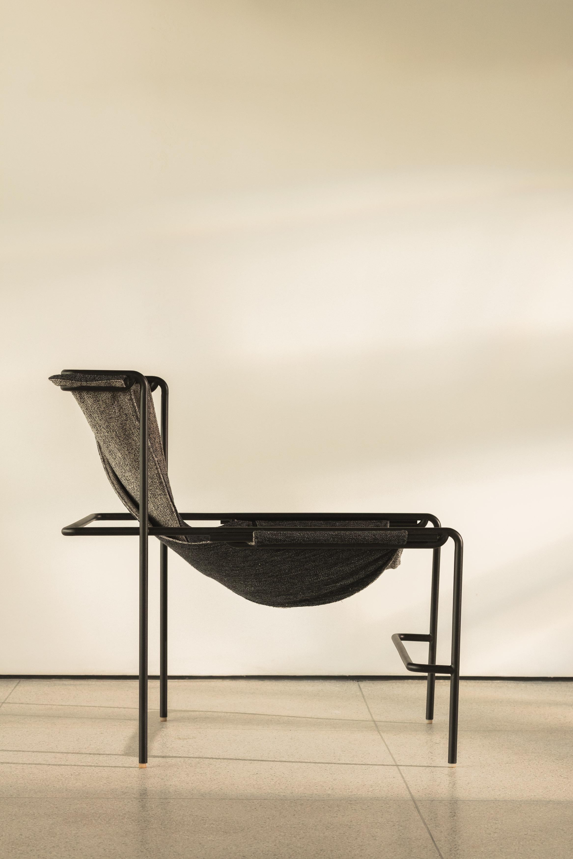 The Padiola lounge chair pays homage to textiles. Its structure draws inspiration from modern masters and is specifically designed as a framework for displaying various textiles.

These textiles can be hung in a manner that showcases both sides of