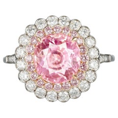 Padparadscha Ceylon sapphire and pink diamond cluster ring.