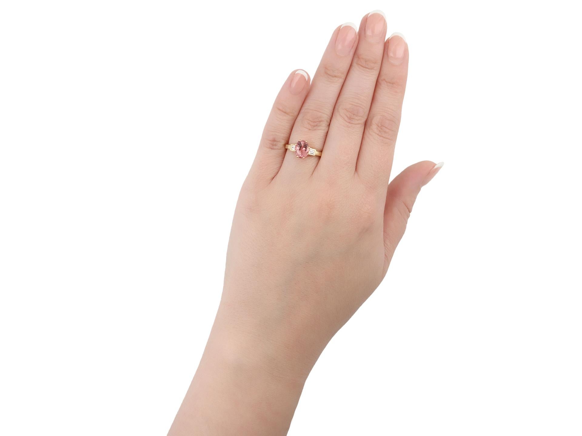Padparadscha sapphire and diamond flanked solitaire ring, circa 1990. For Sale 2