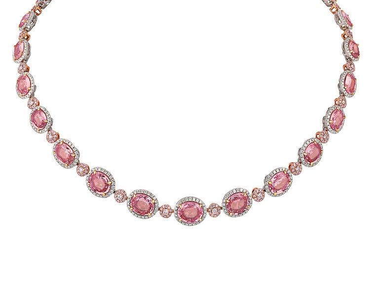 Twenty-five of the rarest of all sapphires - the Padparadscha sapphire - are set in this one-of-a-kind necklace. Ranging in size from 2.33 carats to 1.05 carats, each displays the unique mix of pink and orange hues reminiscent of the lotus blossom,