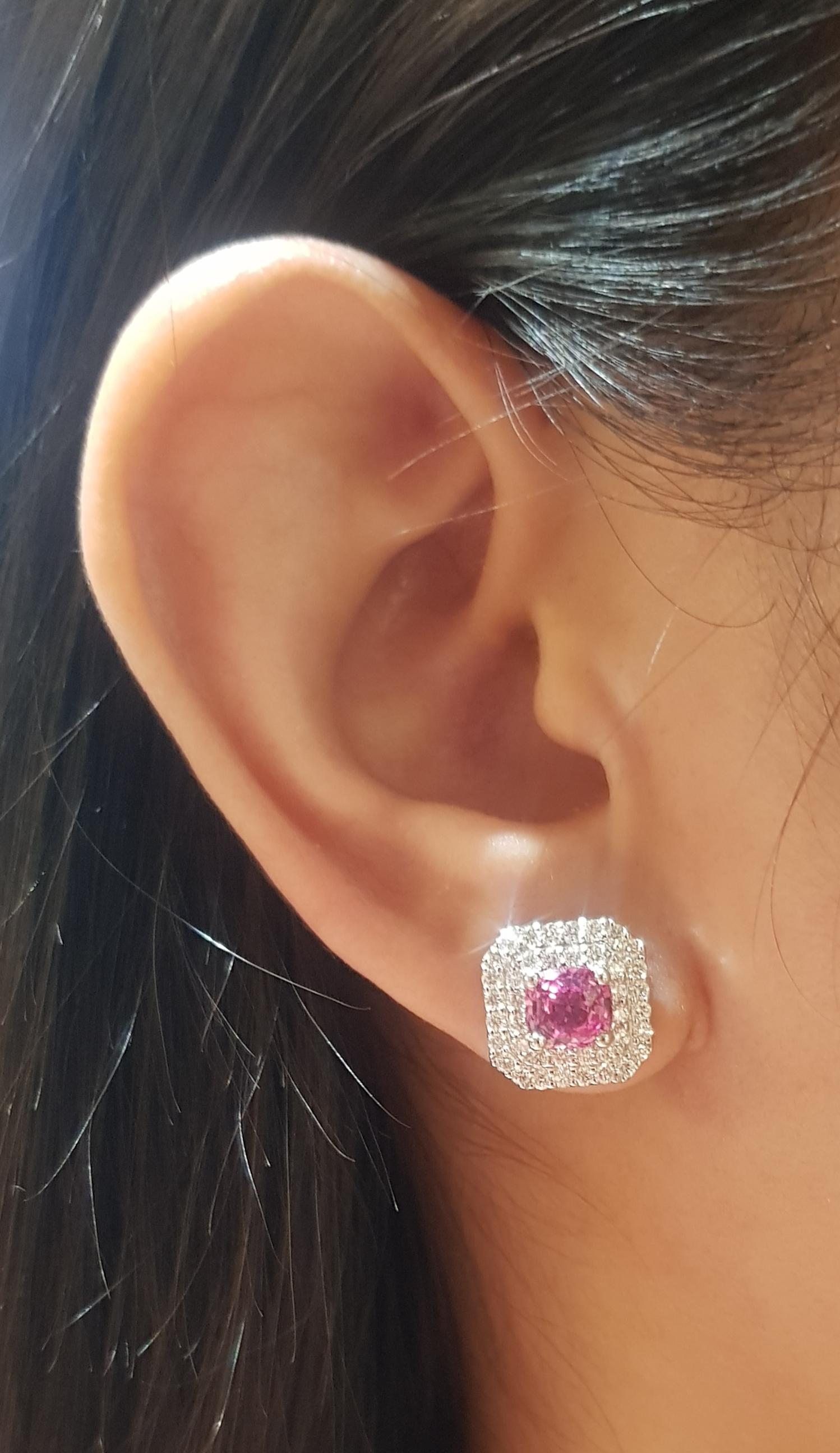 Padparadscha Sapphire 2.53 carats with Diamond 0.87 carat Earrings set in 18K White Gold Settings

Width: 1.2 cm 
Length: 1.2 cm
Total Weight: 8.90 grams

