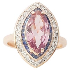 Bague Padparadscha avec saphir bleu et diamant en or rose 18 carats