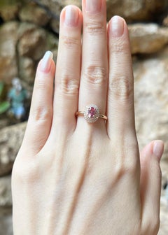 Padparadscha with Diamond Ring set in 18K Rose Gold Settings
