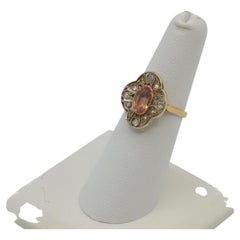 Padparadschah Oval Sapphire Approximately 1.10 Carat, Diamond & 14 Karat Ring